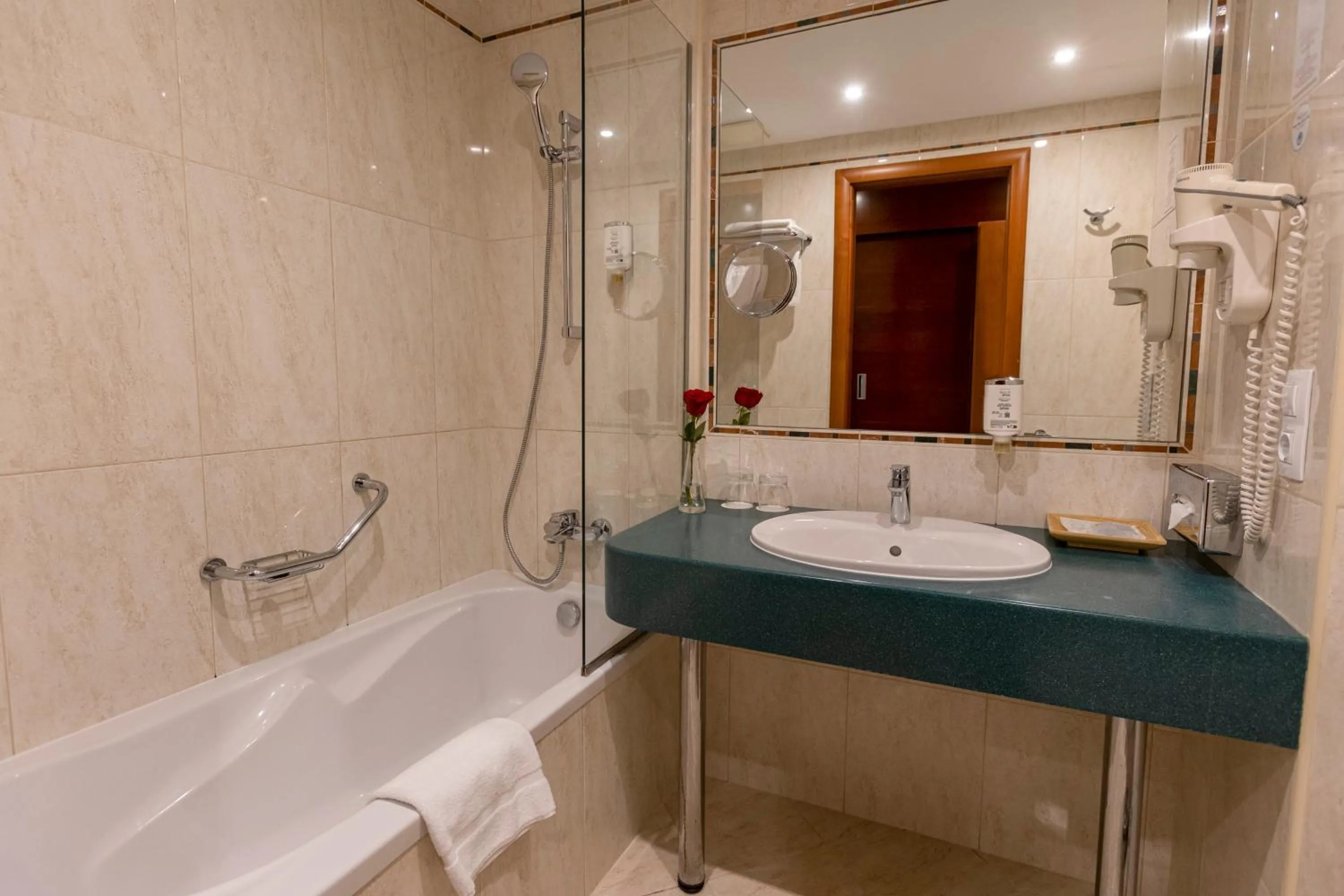 Bathroom in Lion's Garden Hotel