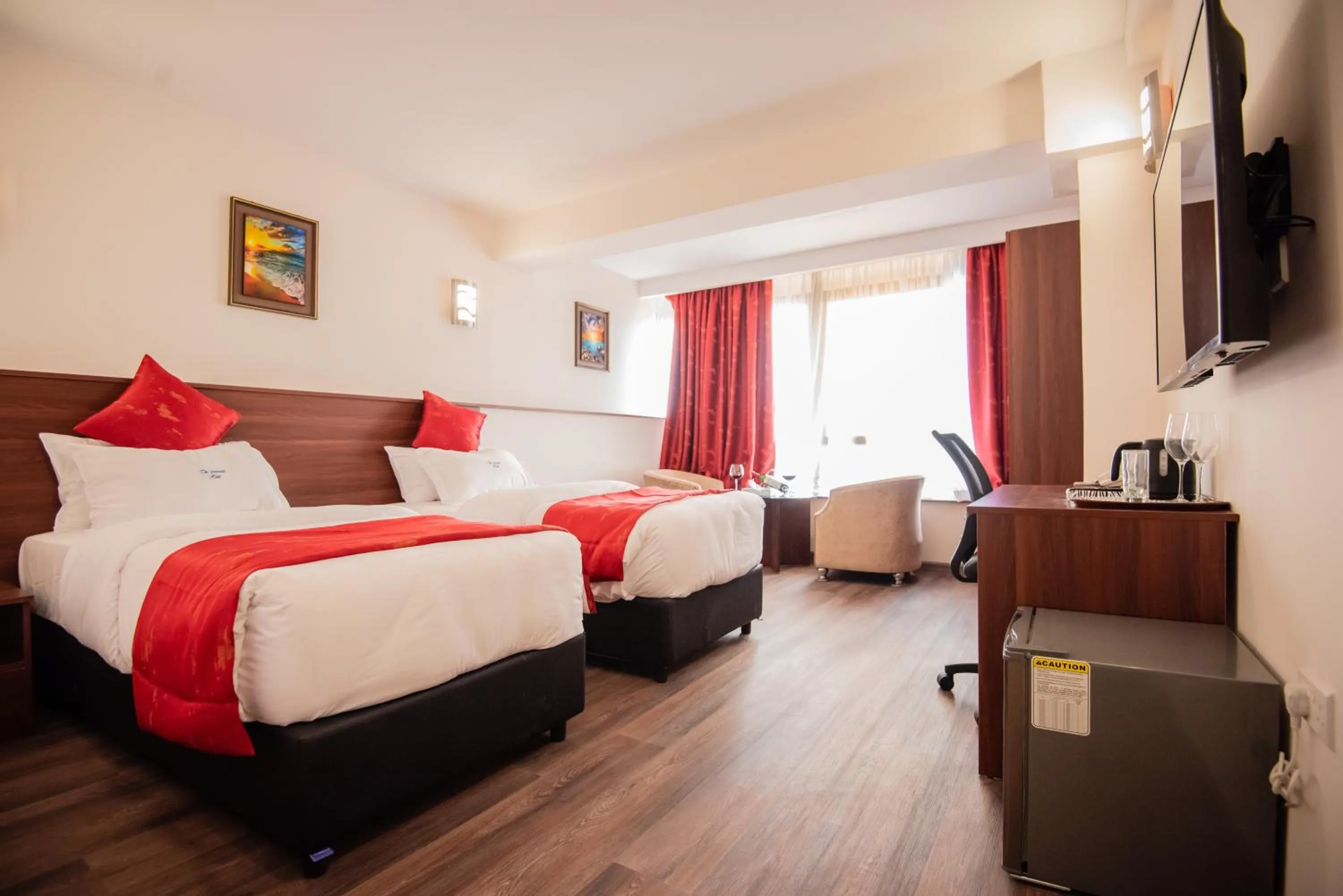 Bed in The Crossroads Hotel, Westlands