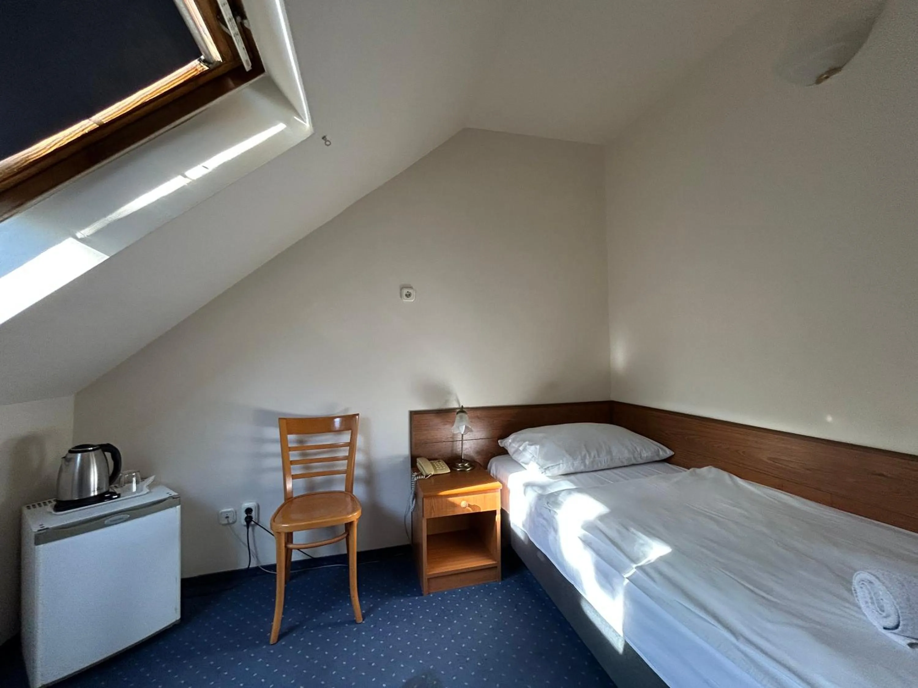 Photo of the whole room, Bed in Corvin Hotel