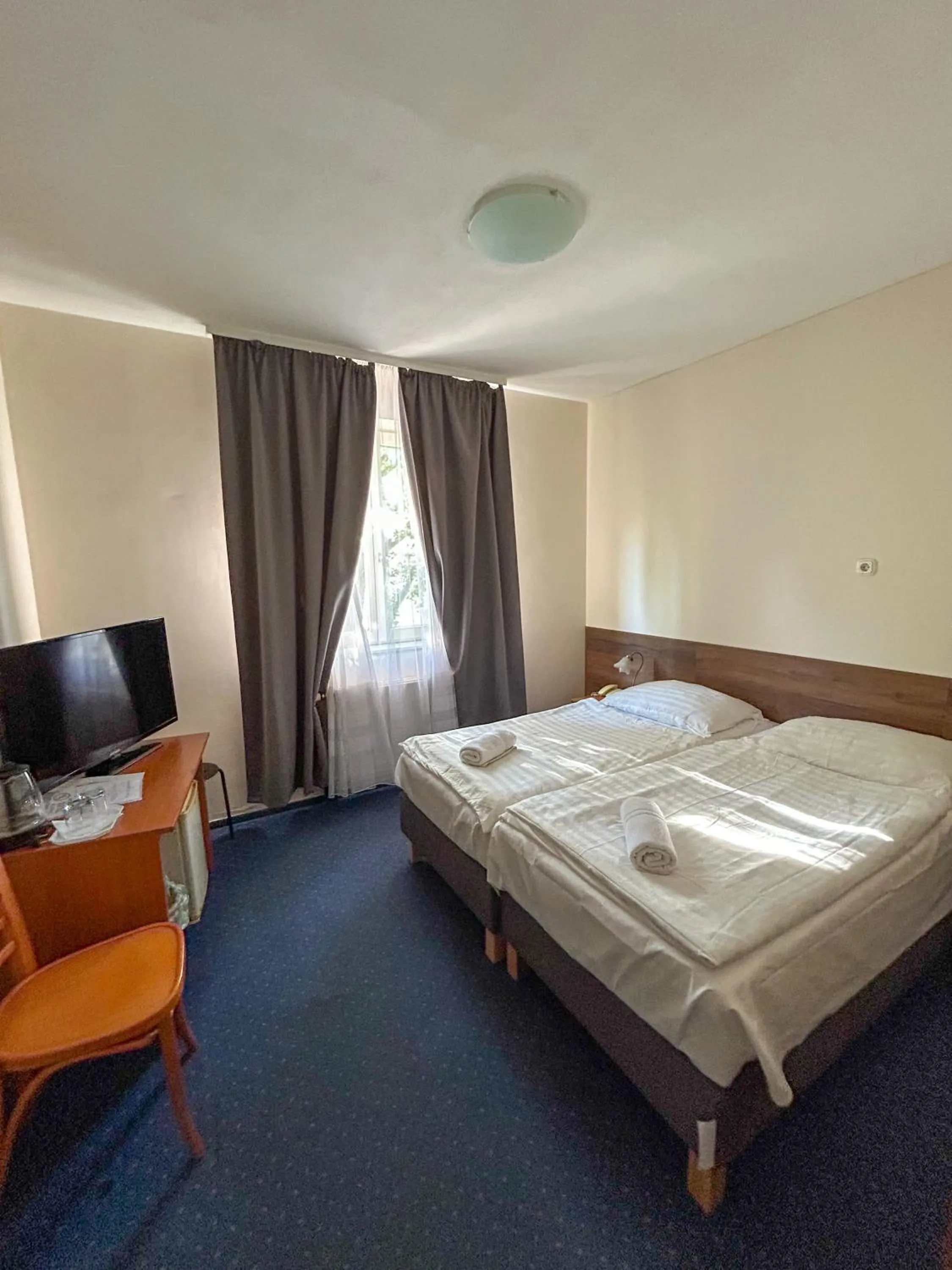 Photo of the whole room, Bed in Corvin Hotel