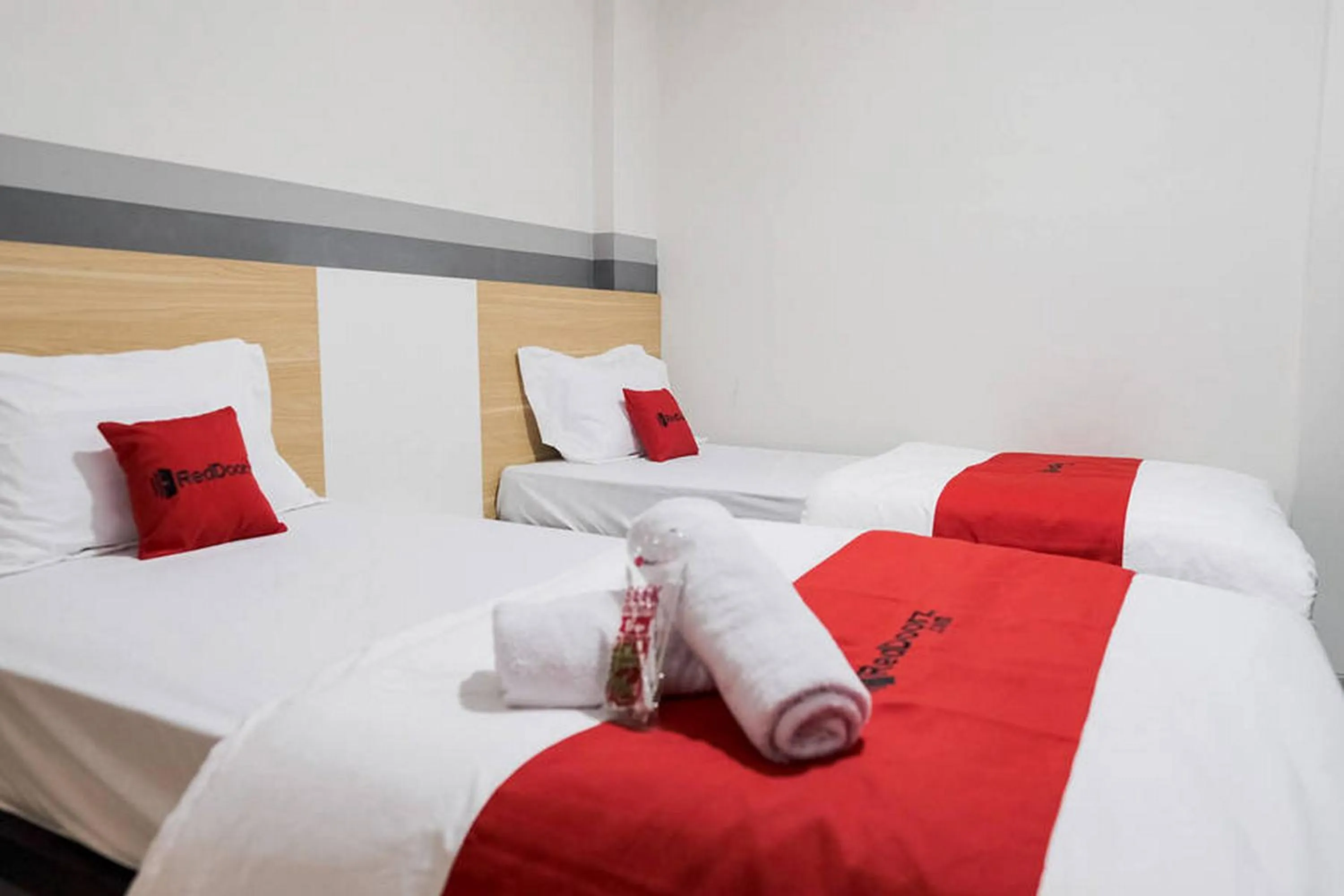 Bed in RedDoorz Plus near Taman Anggrek Mall