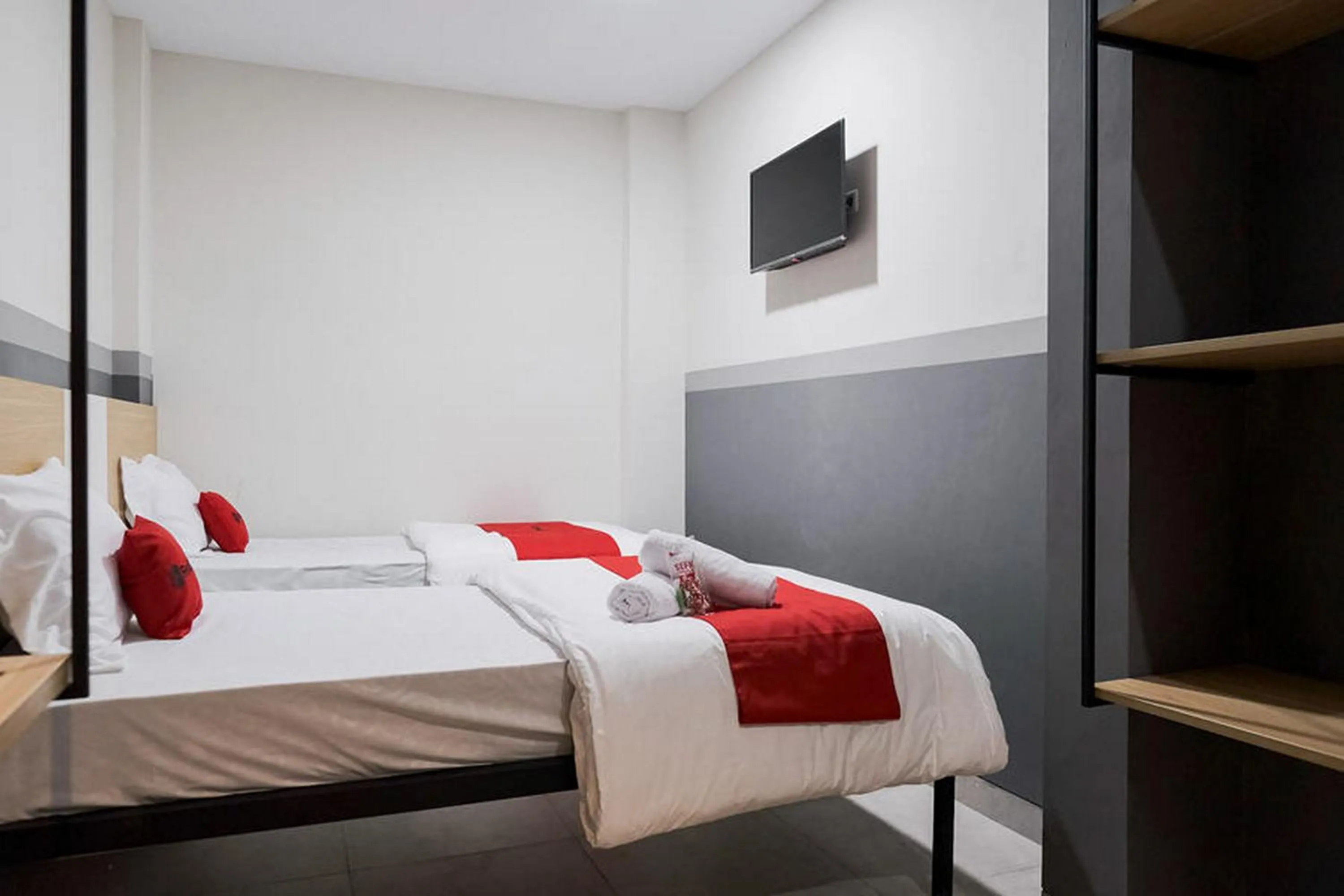 Bed in RedDoorz Plus near Taman Anggrek Mall