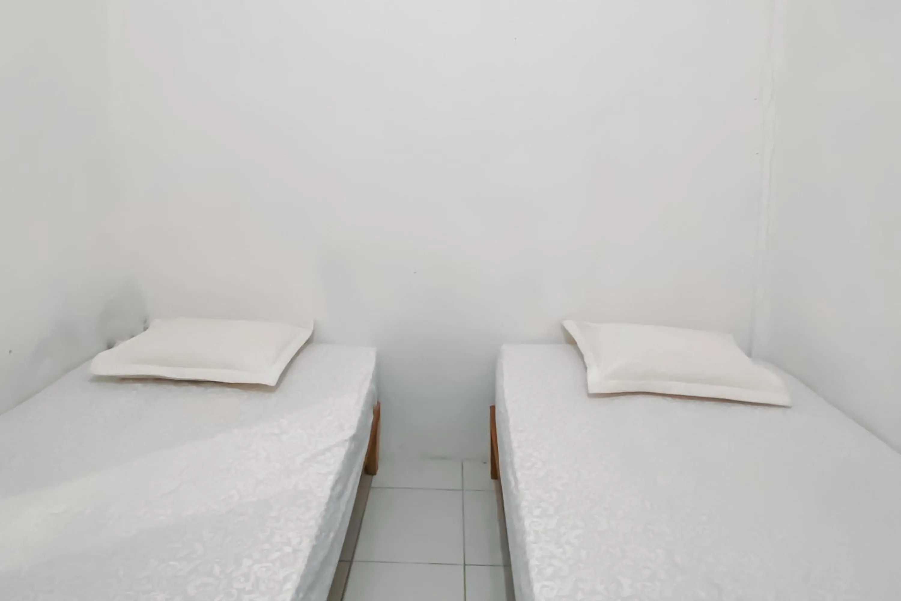 Bedroom in RedDoorz Syariah near RS Harapan Bunda Banda Aceh