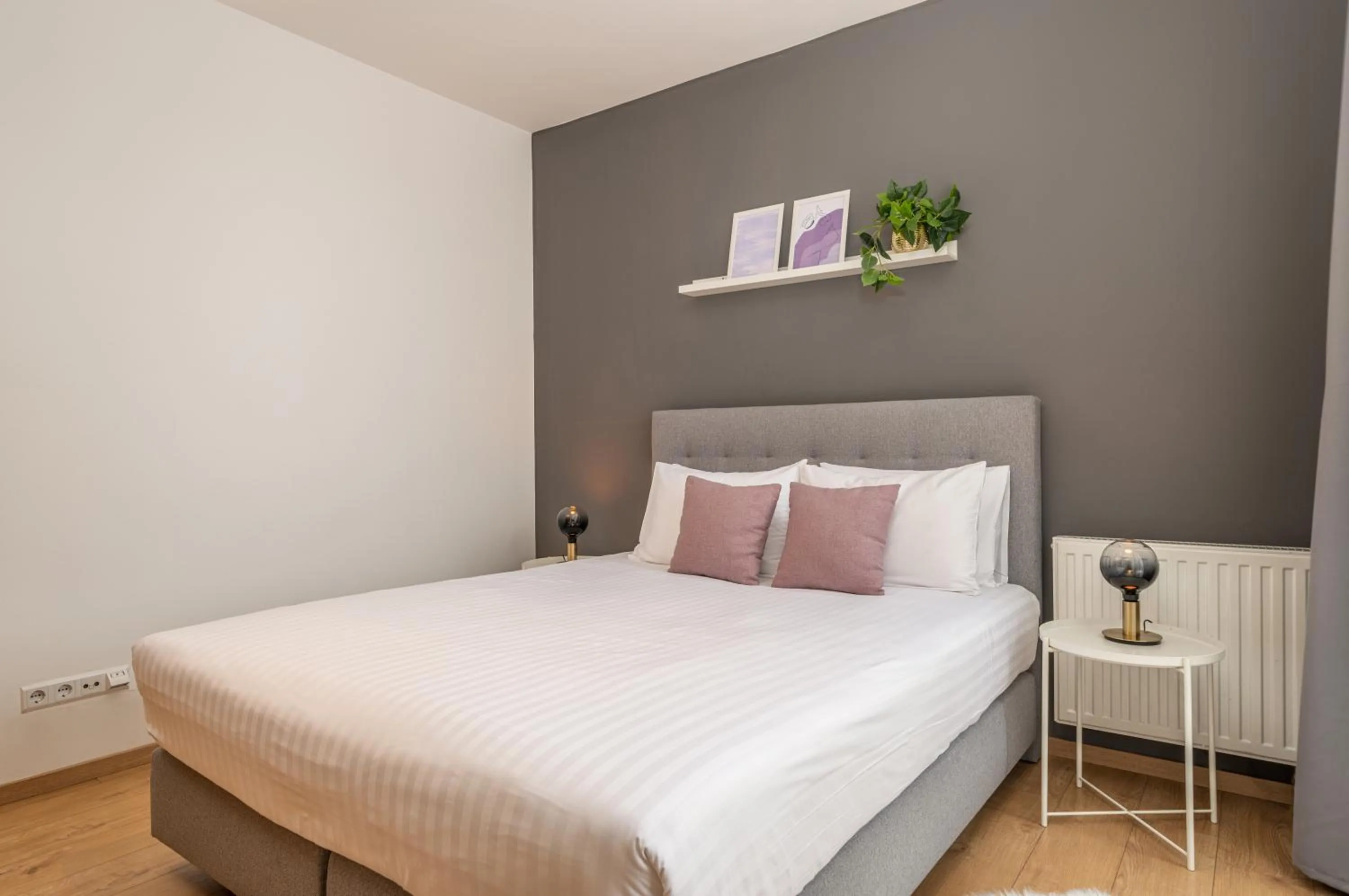 Bedroom in Central Passage Apartments by Vagabond Downtown