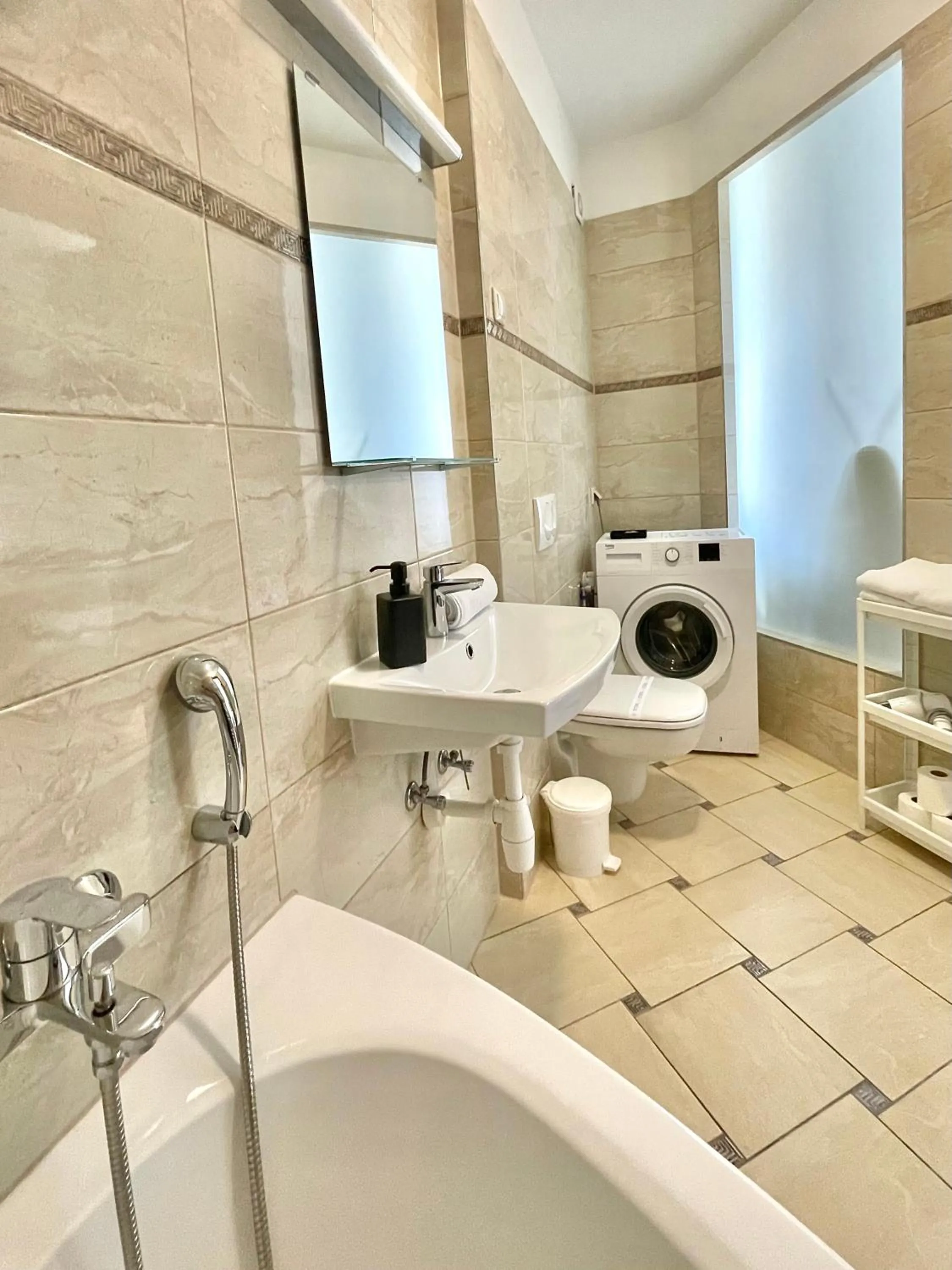 Bathroom in Central Passage Apartments by Vagabond Downtown