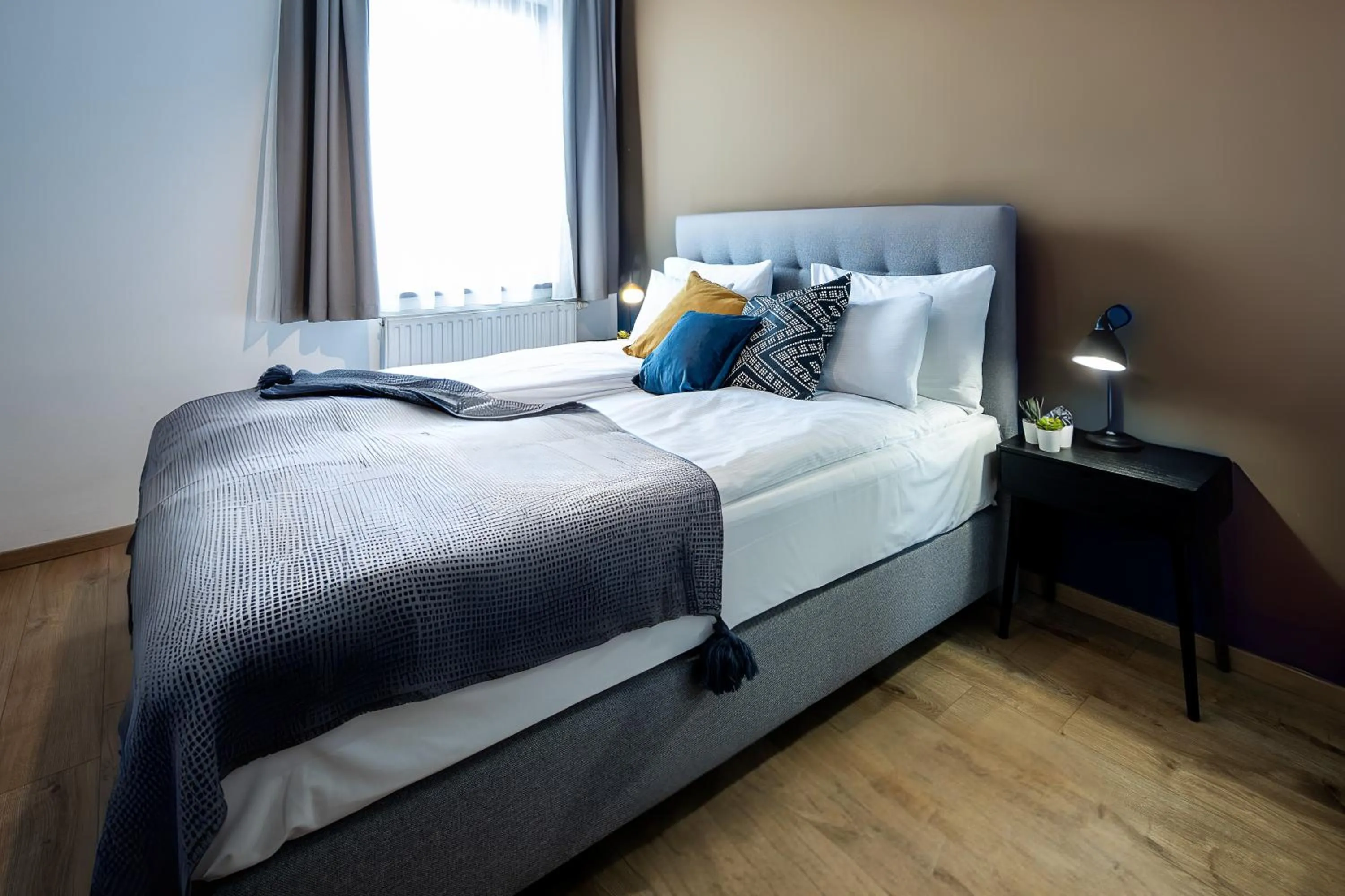 Bedroom in Central Passage Apartments by Vagabond Downtown