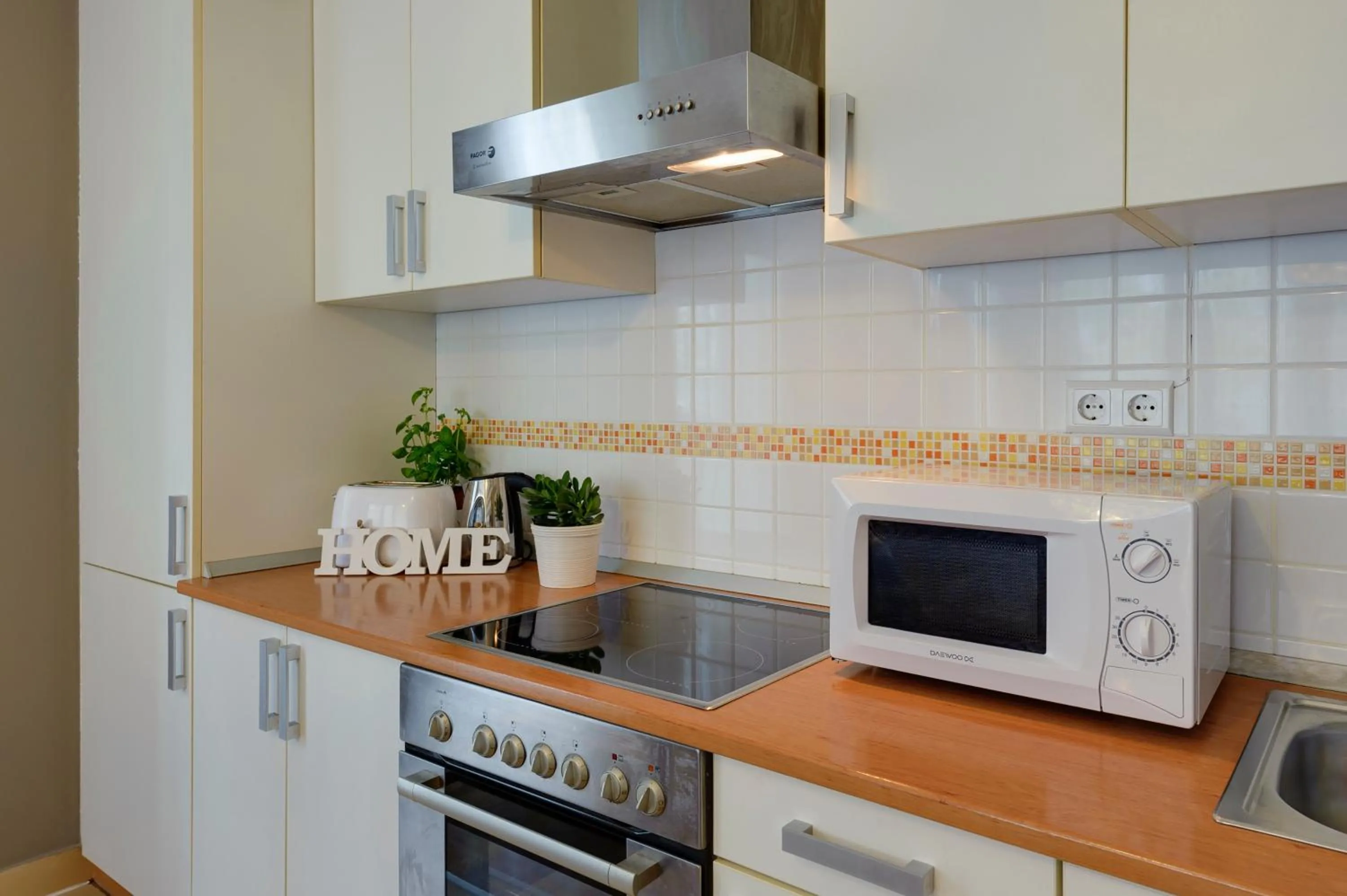 kitchen in Central Passage Apartments by Vagabond Downtown