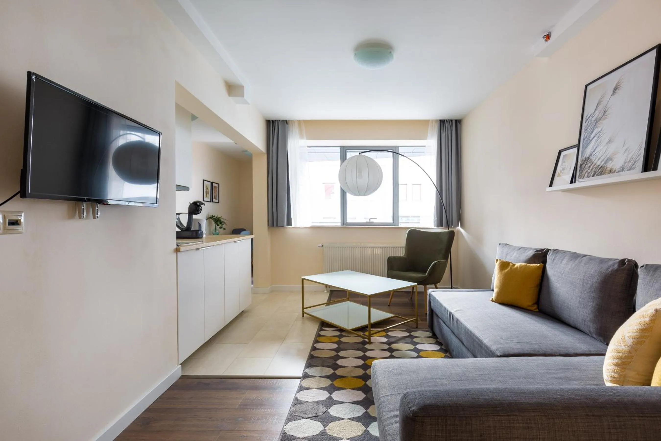 Living room in Central Passage Apartments by Vagabond Downtown