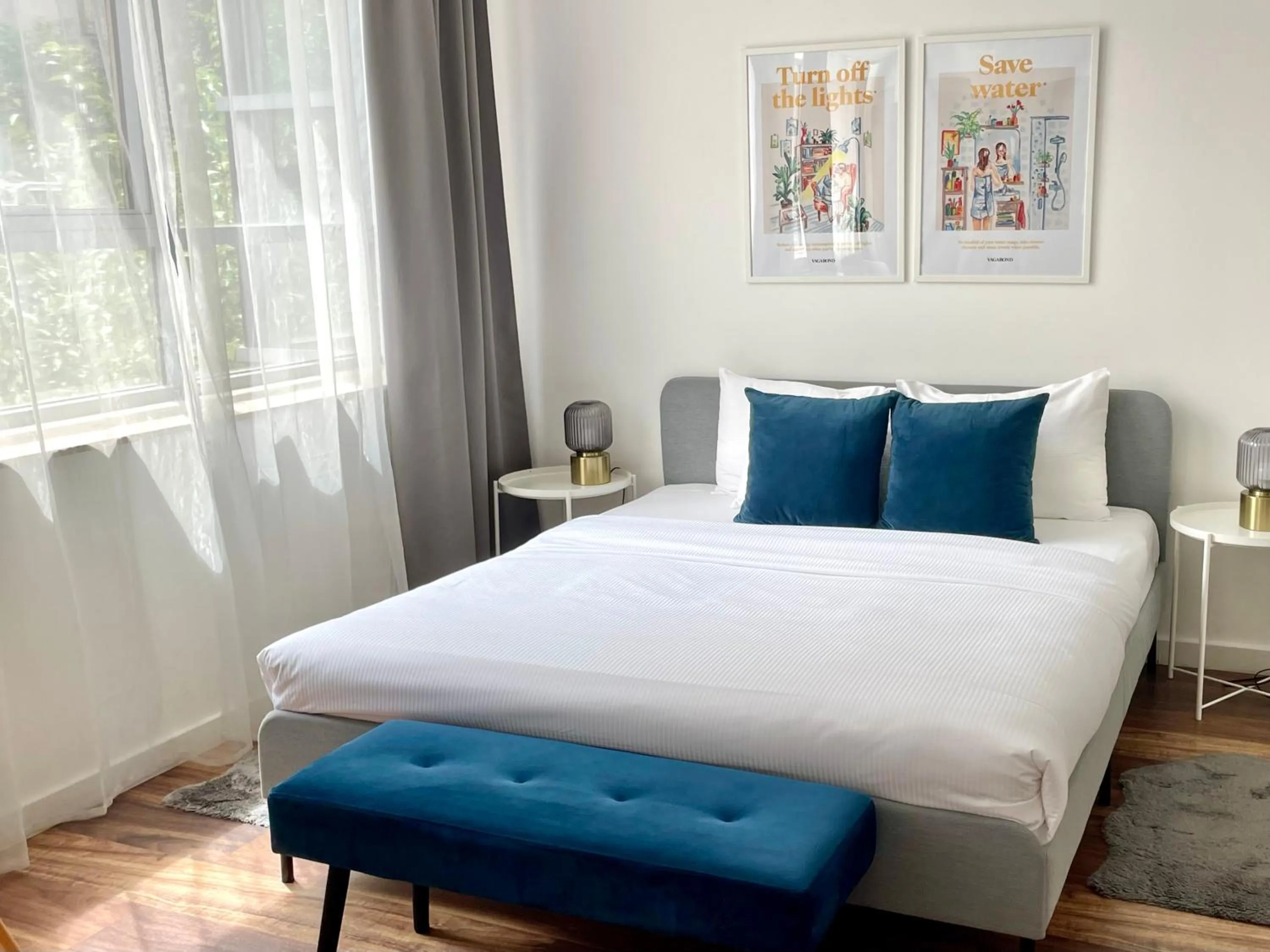 Bed in Central Passage Apartments by Vagabond Downtown