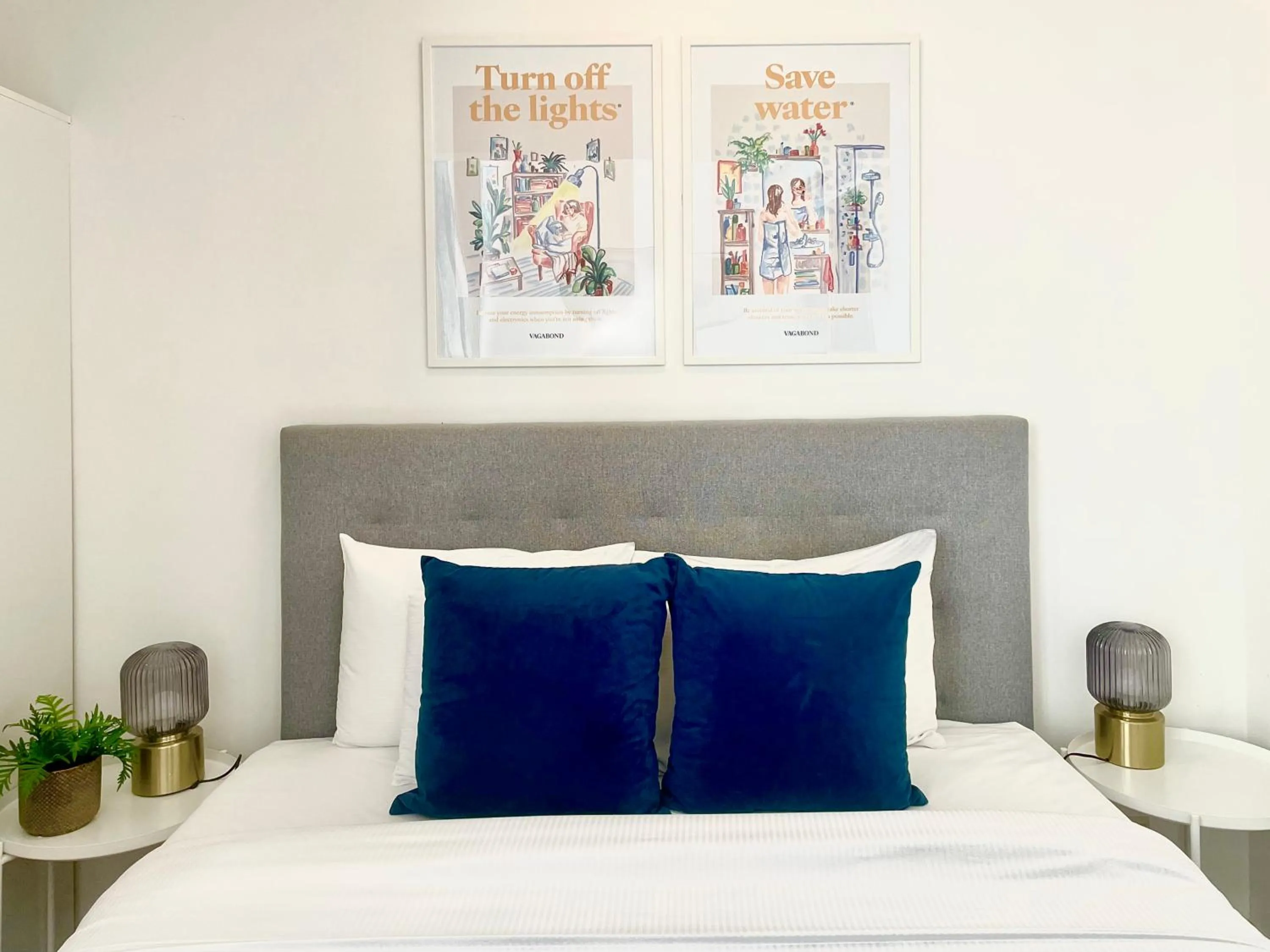 Bed in Central Passage Apartments by Vagabond Downtown