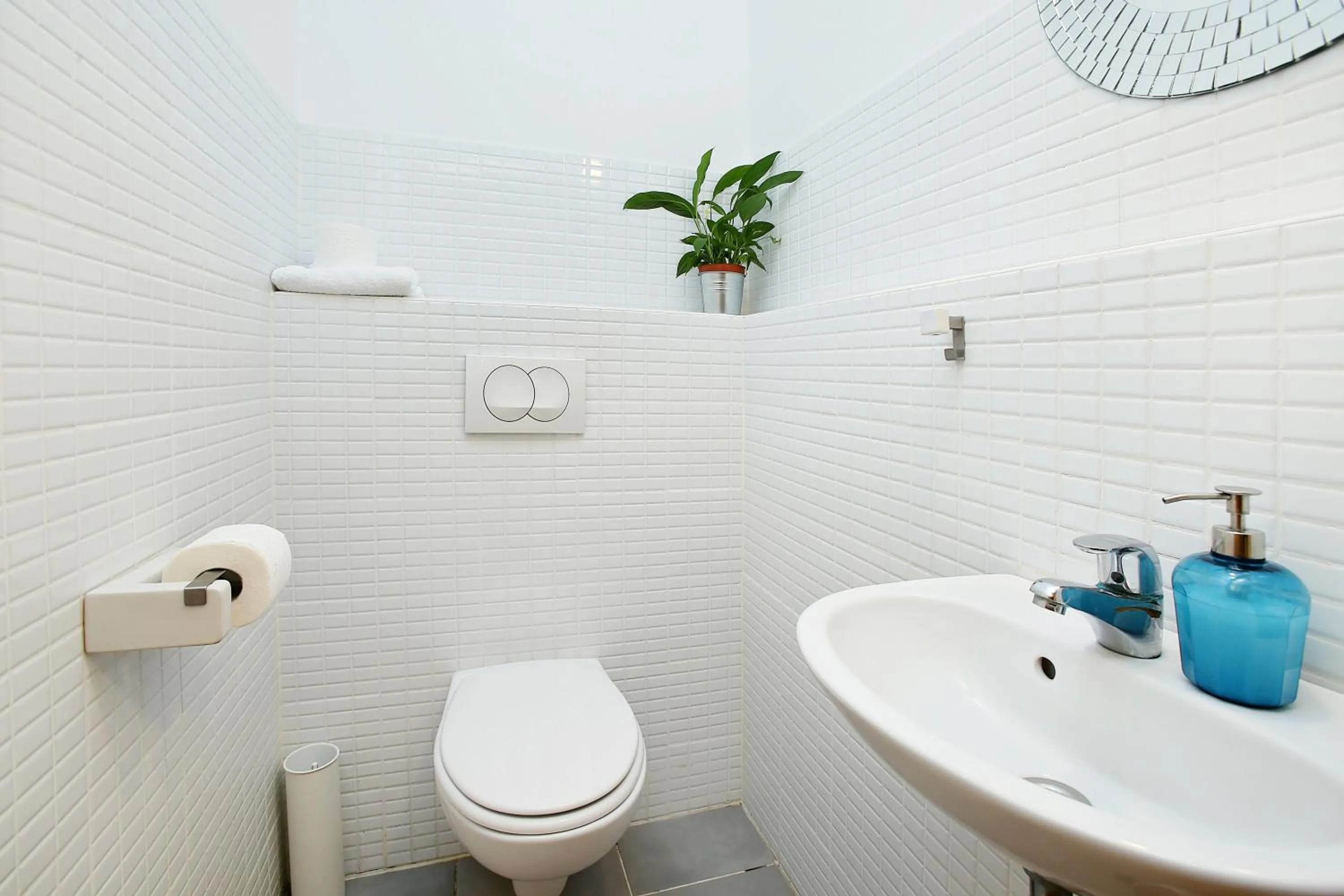 Toilet in Central Passage Apartments by Vagabond Downtown