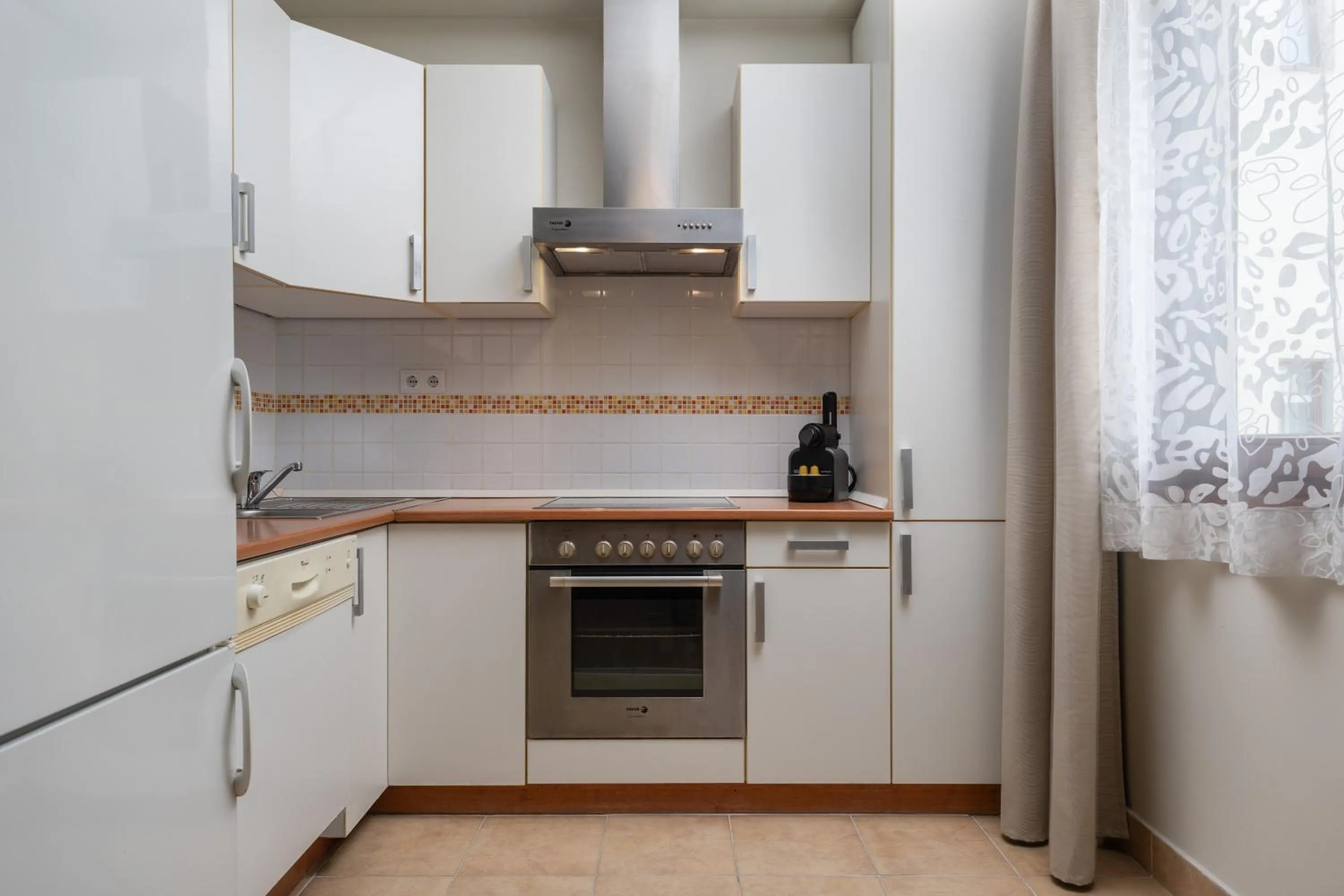 kitchen in Central Passage Apartments by Vagabond Downtown