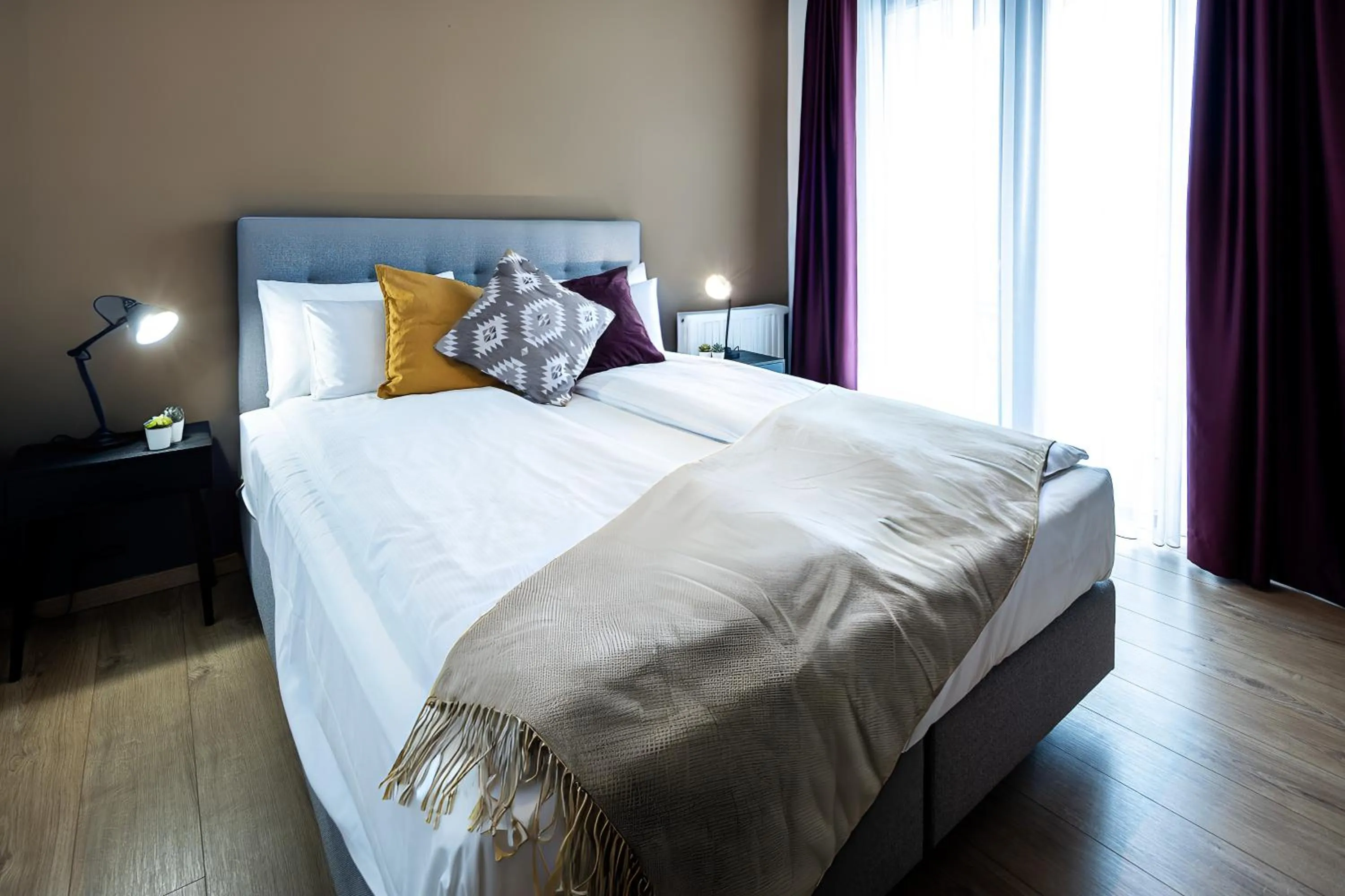 Bedroom in Central Passage Apartments by Vagabond Downtown