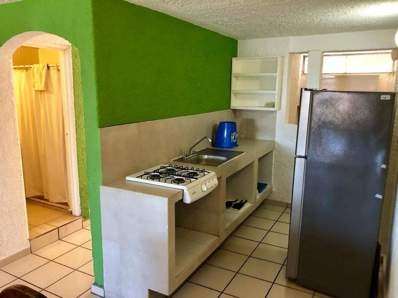 Kitchen or kitchenette in Suites Santa Barbara