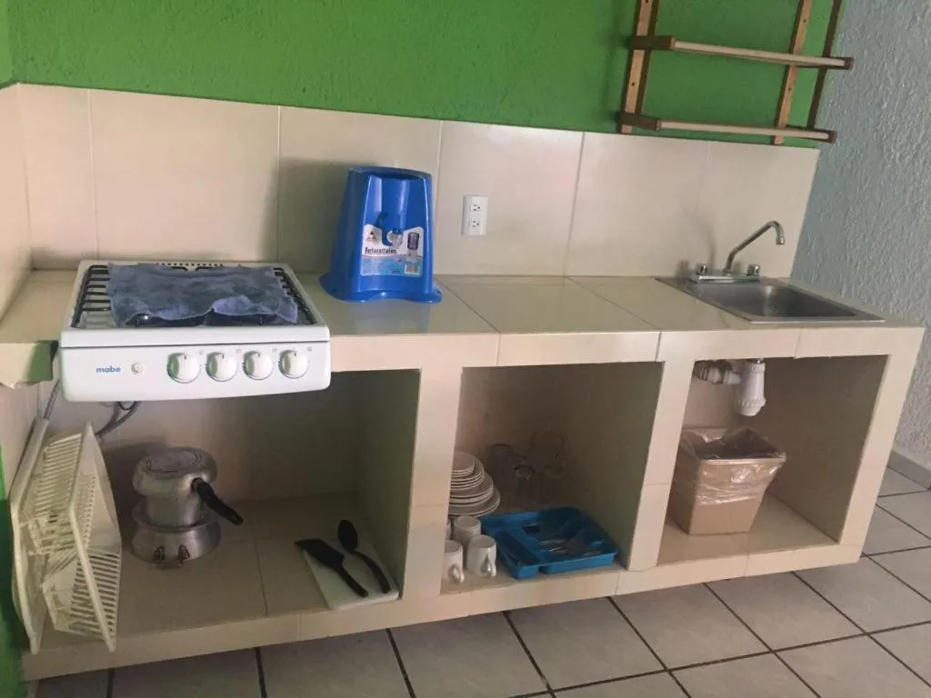 Kitchen or kitchenette in Suites Santa Barbara