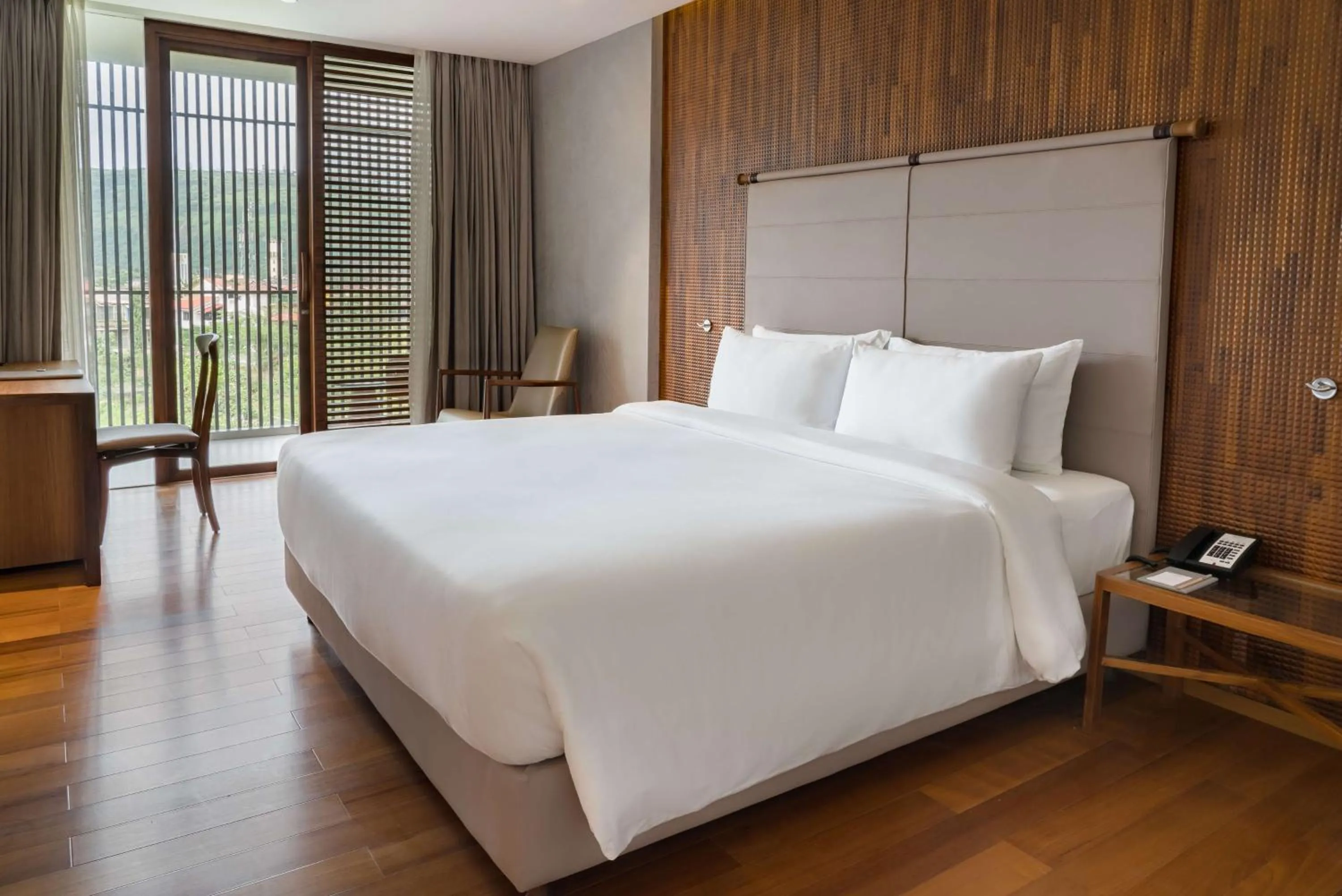 Bed in Radisson Resort and Spa Lonavala