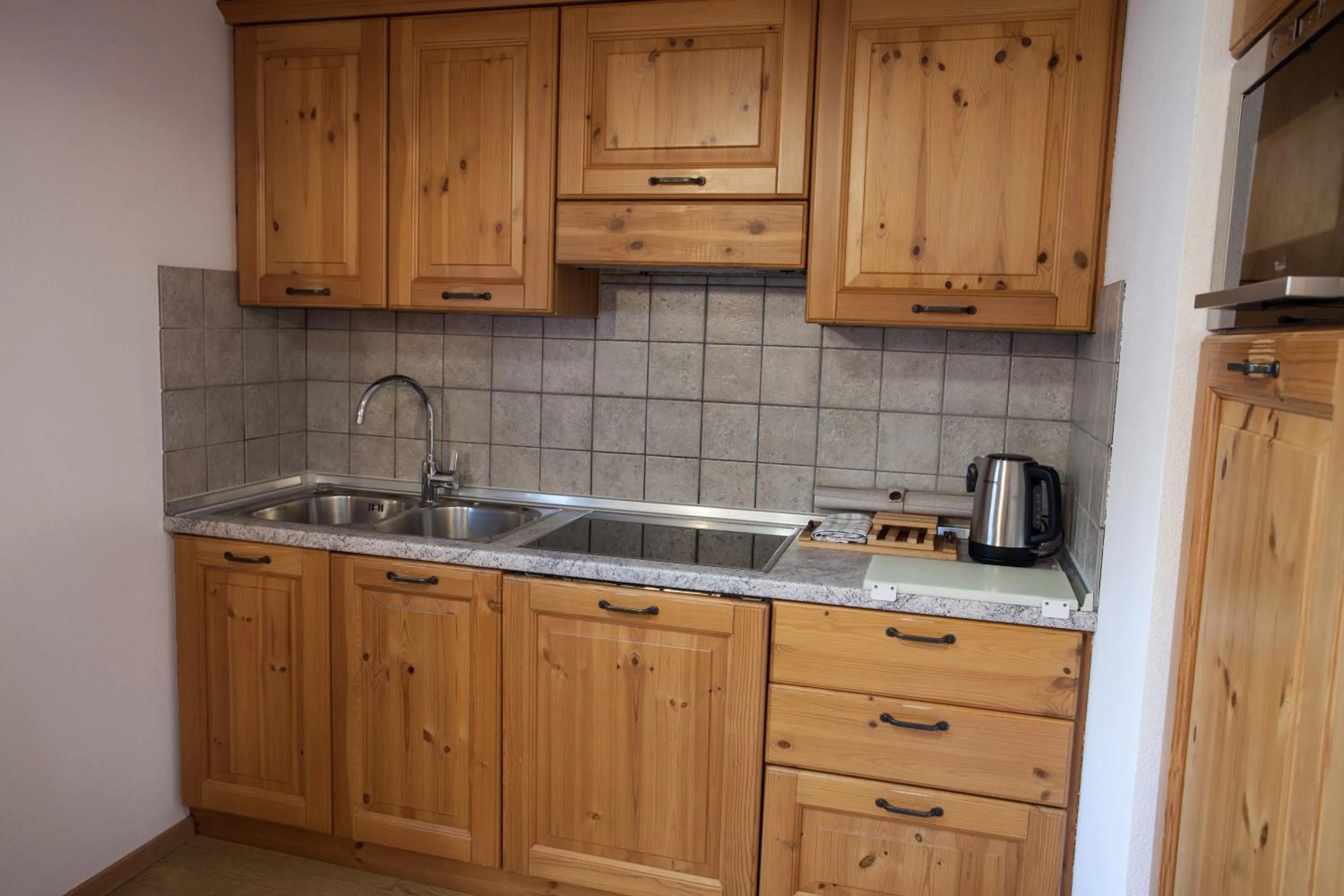 Kitchen or kitchenette in lareit appartamenti