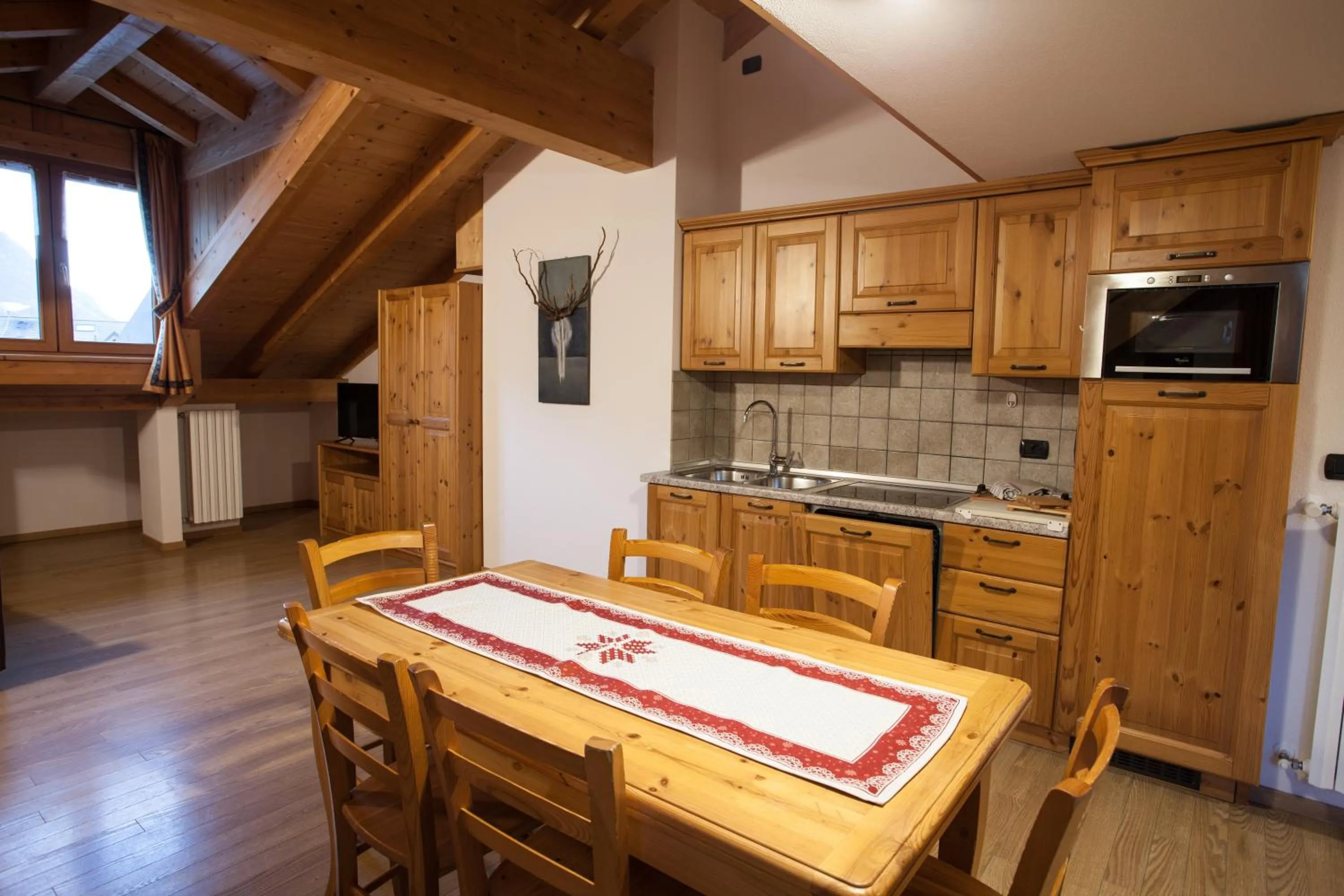 Kitchen or kitchenette in lareit appartamenti
