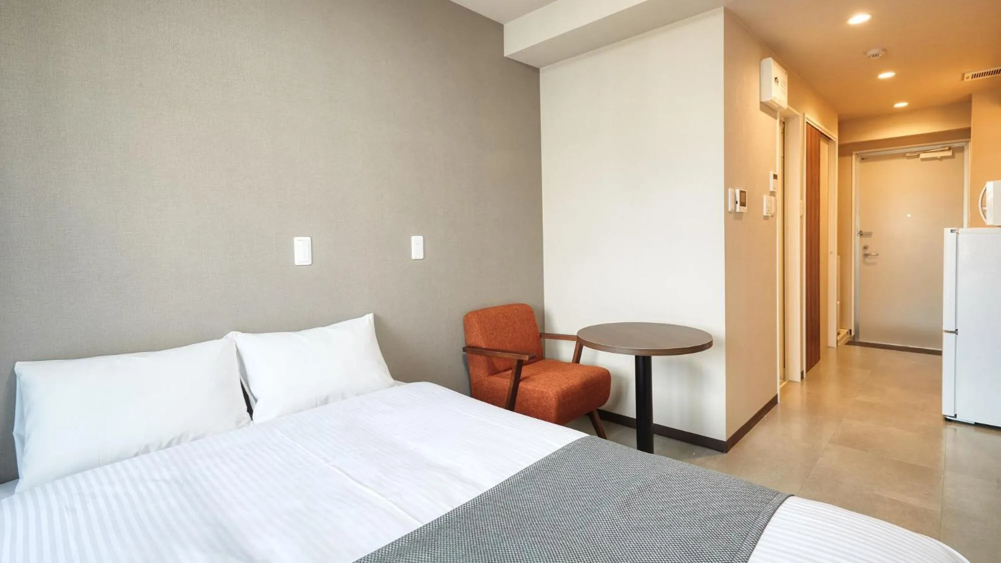 Photo of the whole room, Bed in New Normal Hotel in MATSUYAMA ニューノーマルホテルイン松山