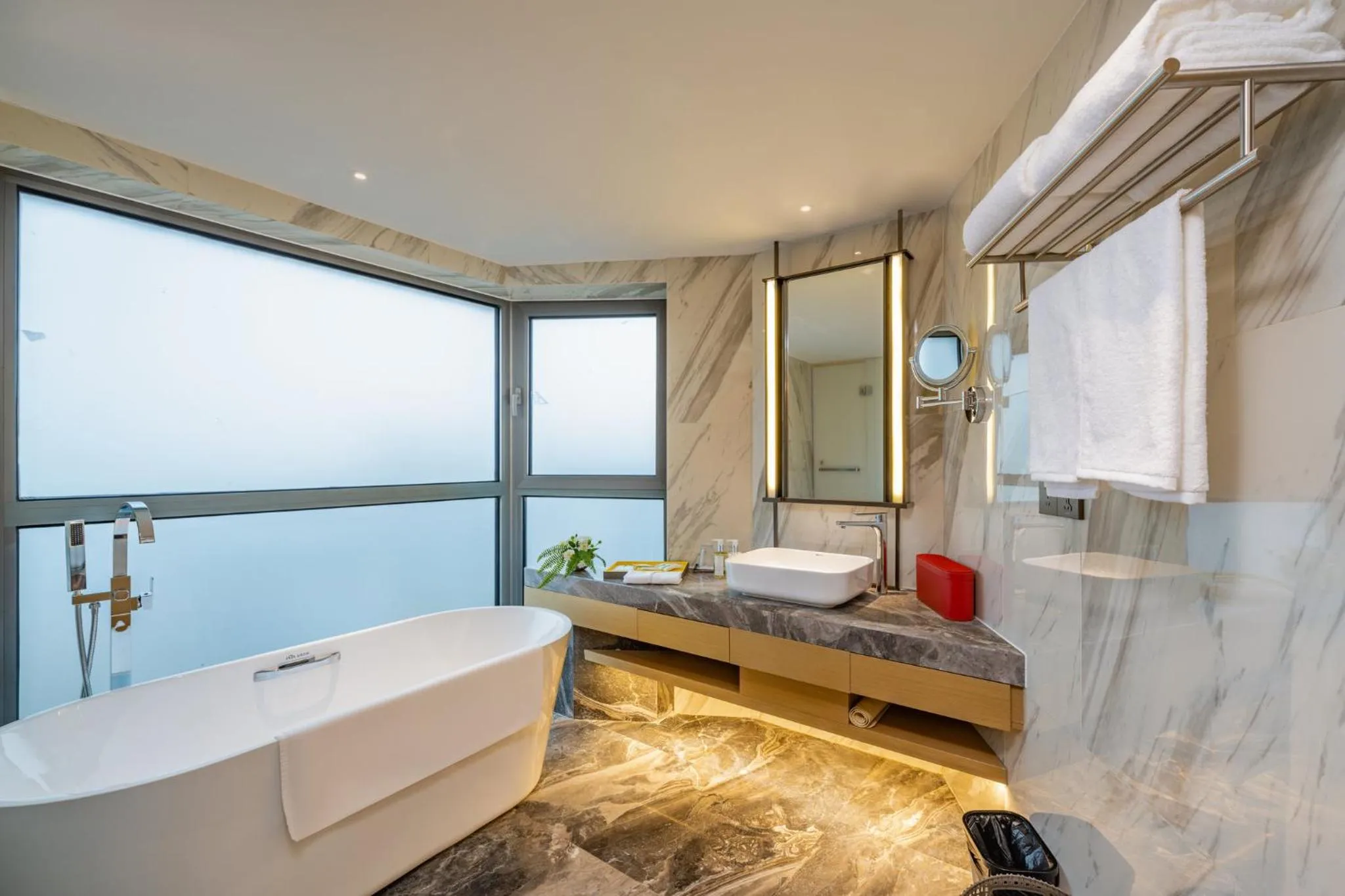 Bathroom in Holiday Inn Shanghai Huaxia by IHG - overlooking city scenery at Sky View Restaurant