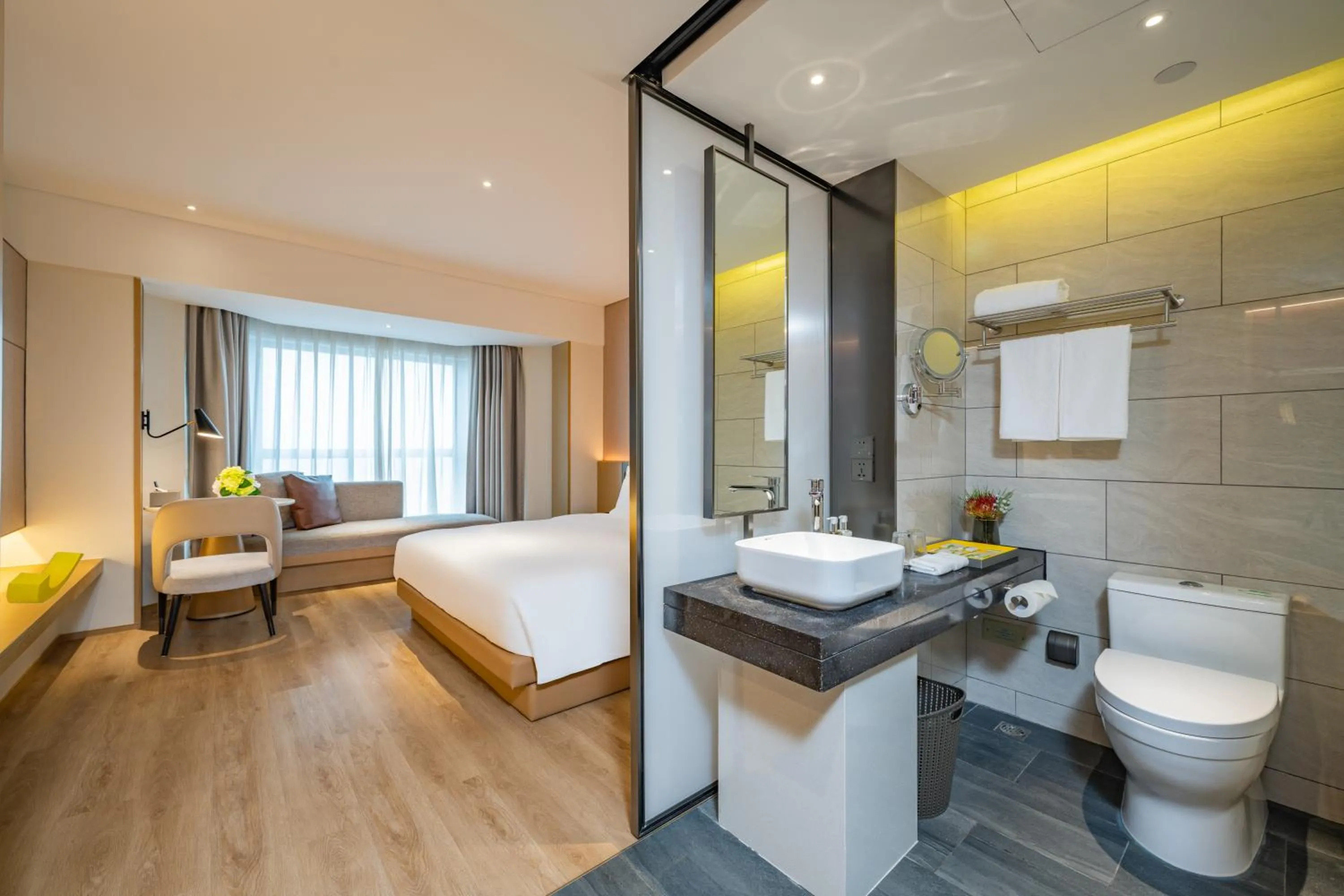 Toilet, Bed in Holiday Inn Shanghai Huaxia by IHG - overlooking city scenery at Sky View Restaurant