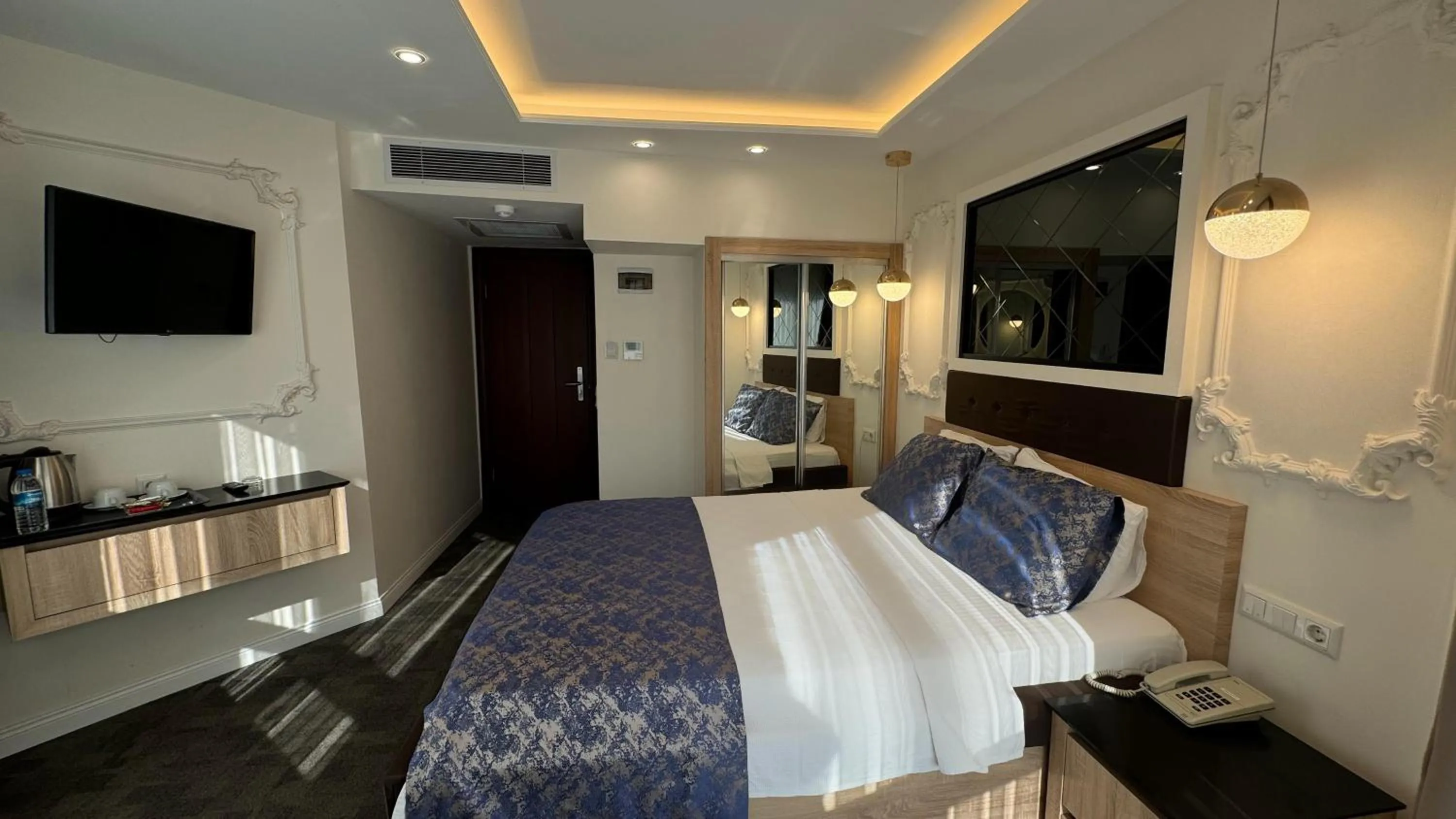 Bed in AYDINLI HOTEL