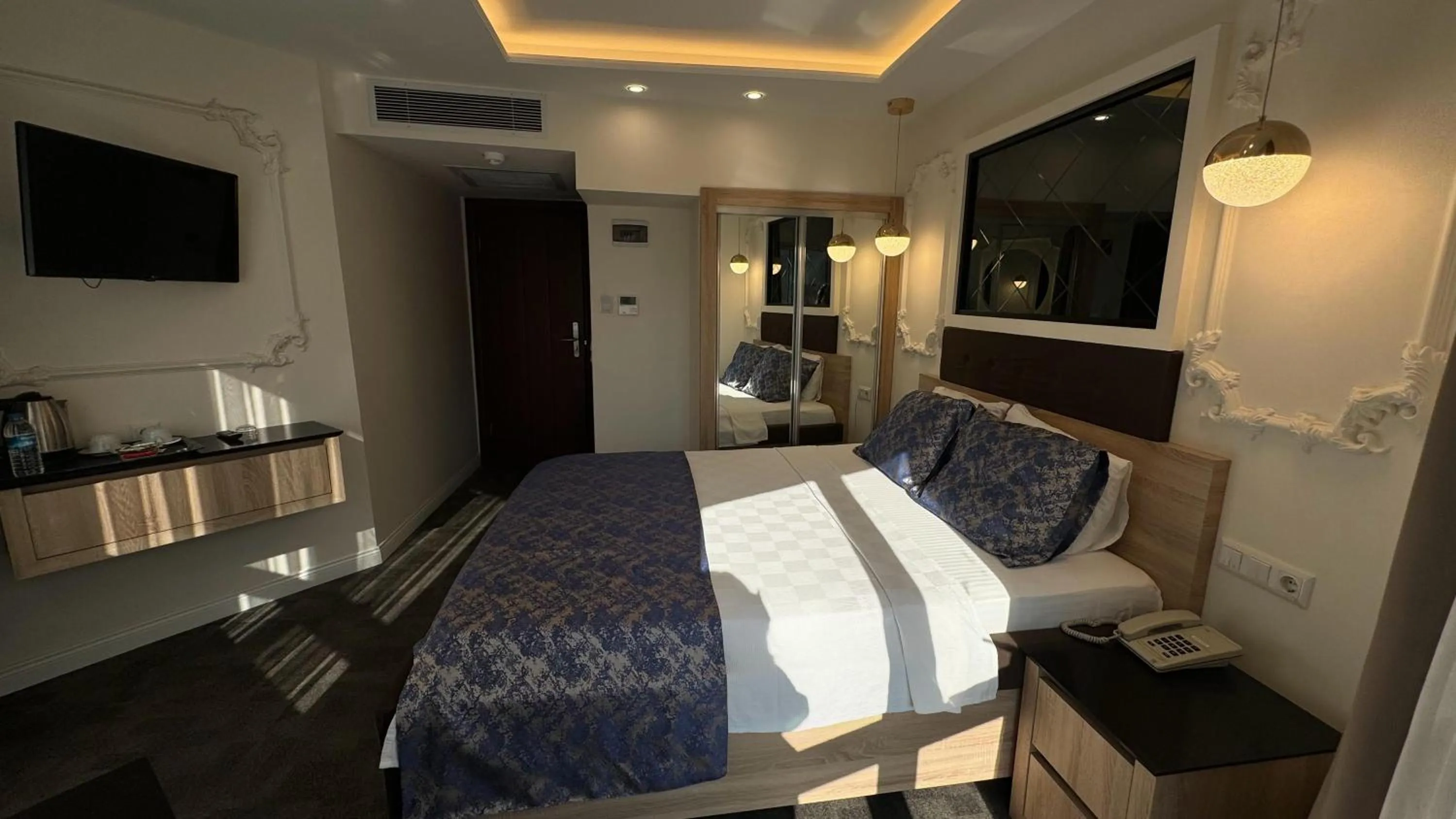 Bed in AYDINLI HOTEL