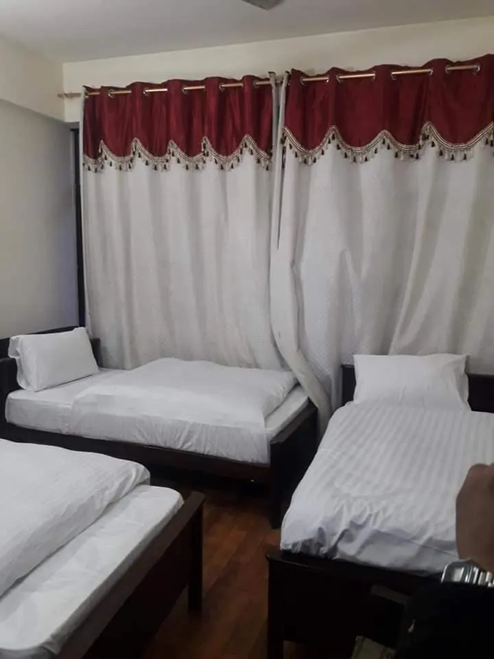 Bed in Hotel Deewan-E-Aziz Internationa