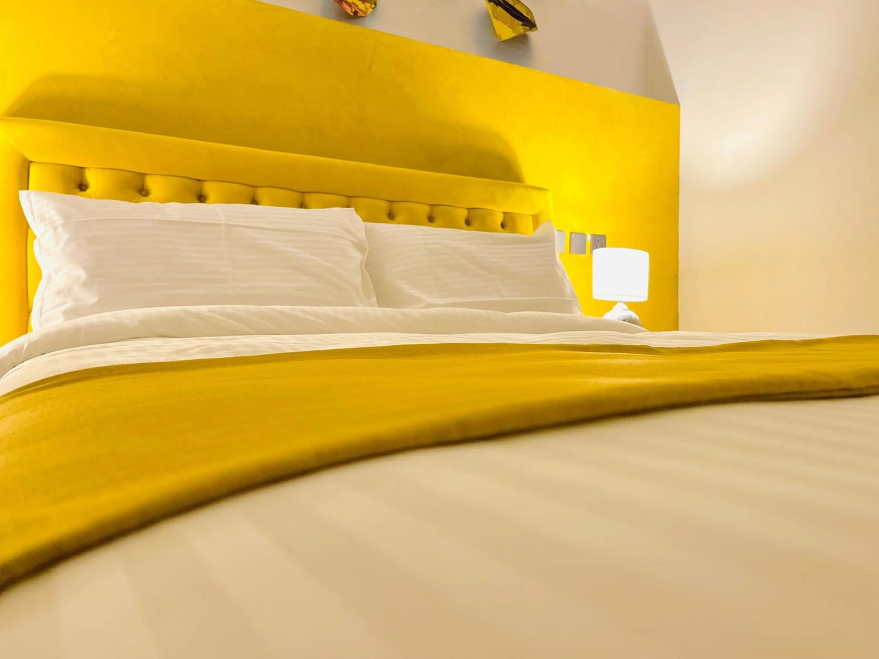 Decorative detail, Bed in Casa Reale Boutique Hotel