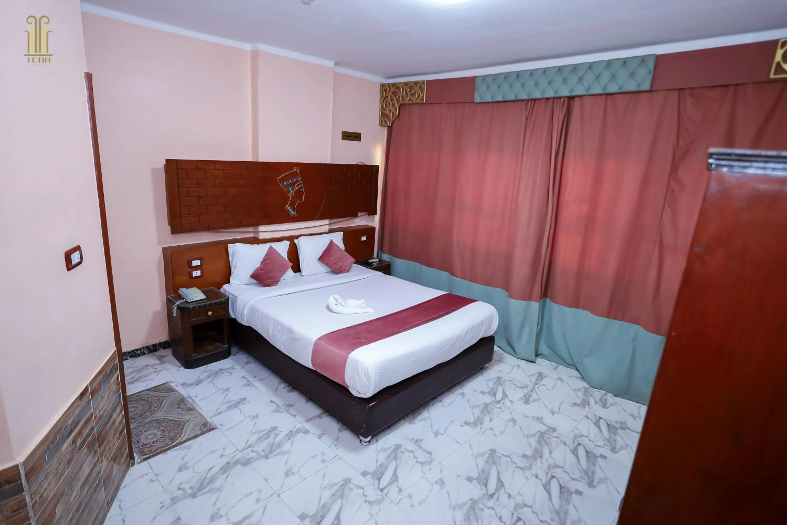 Bed in Tiba Hotel