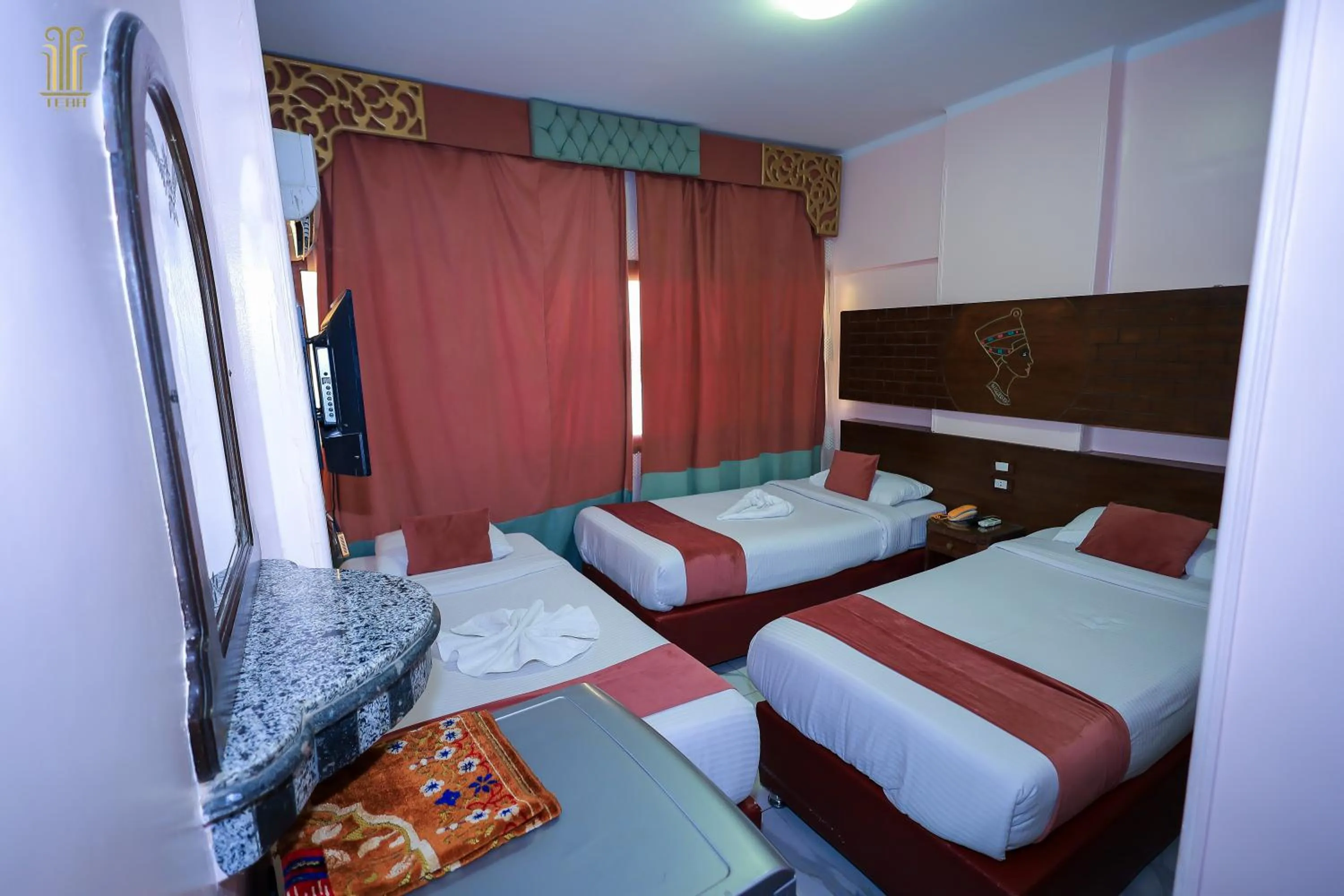 Bed in Tiba Hotel