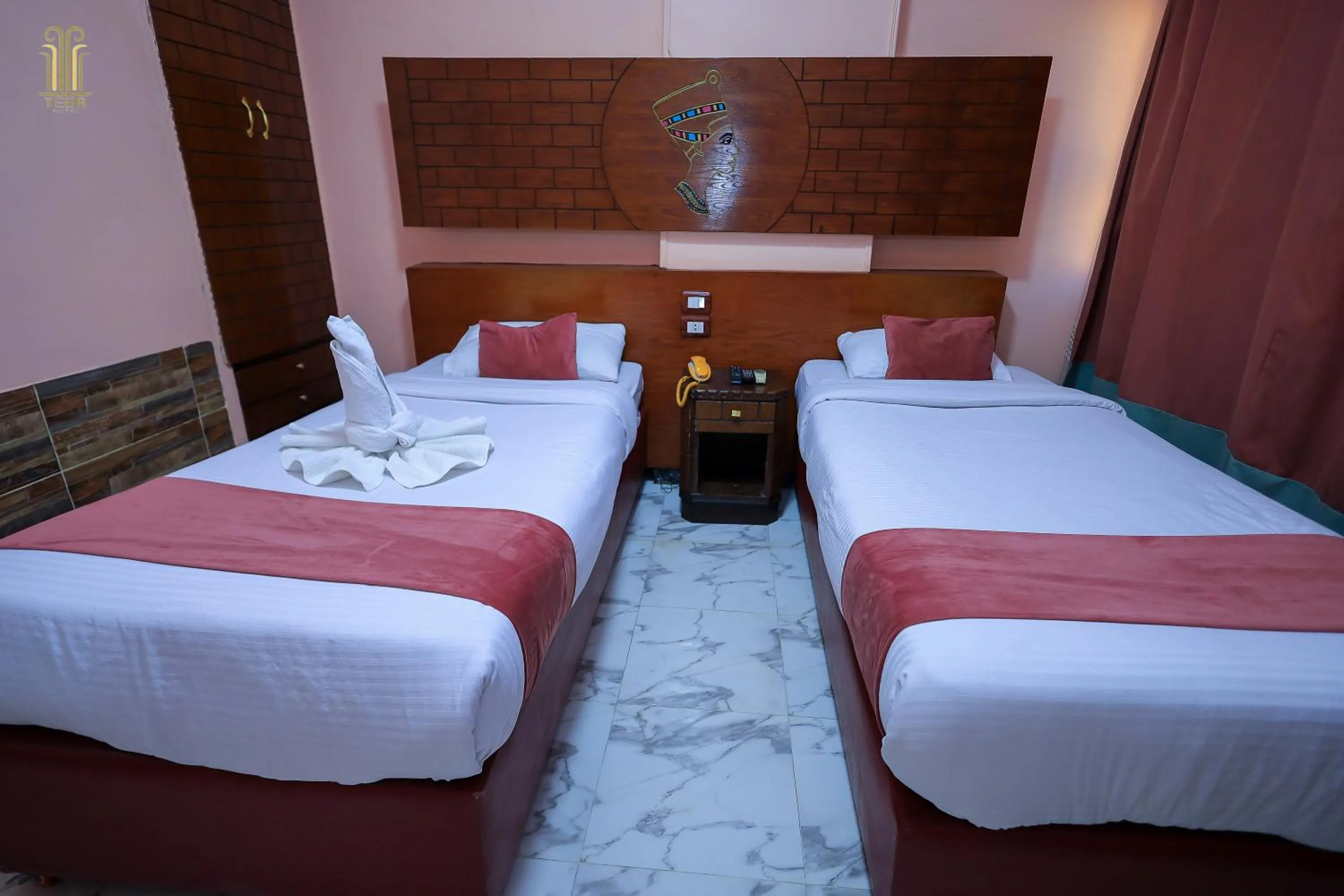 Bed in Tiba Hotel
