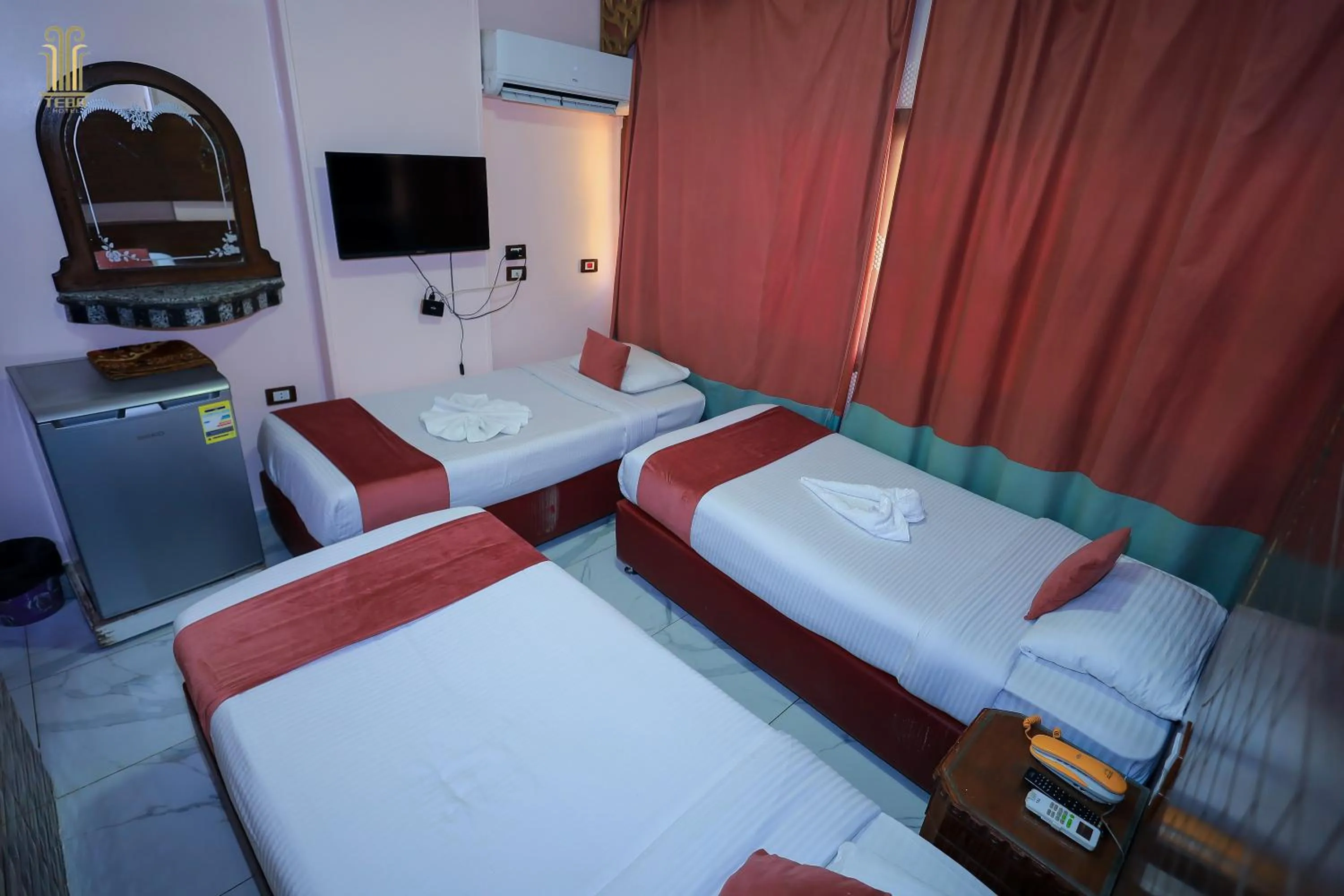 Bed in Tiba Hotel