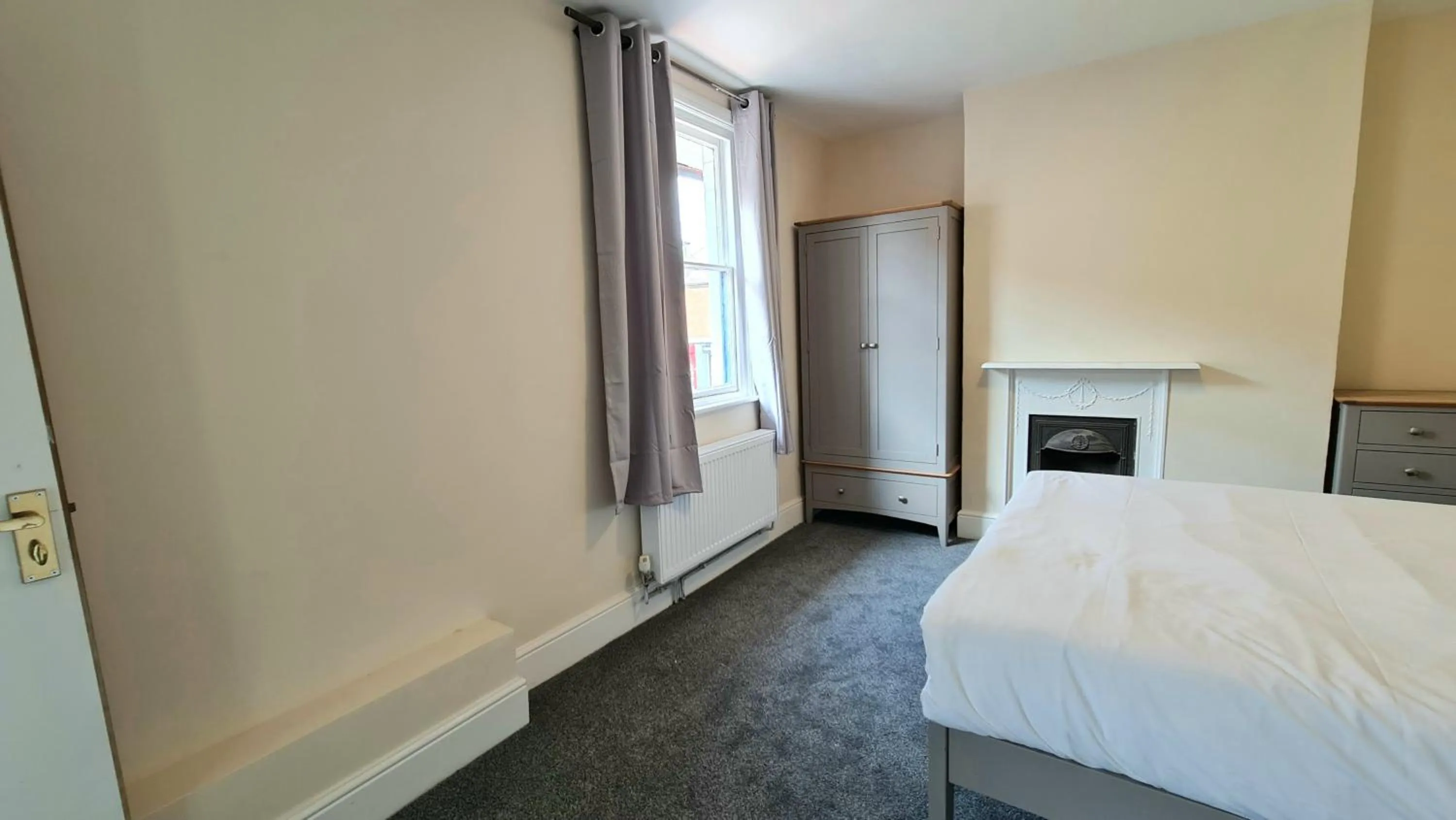 Bedroom, Bed in Grace Apartments - Living Rock