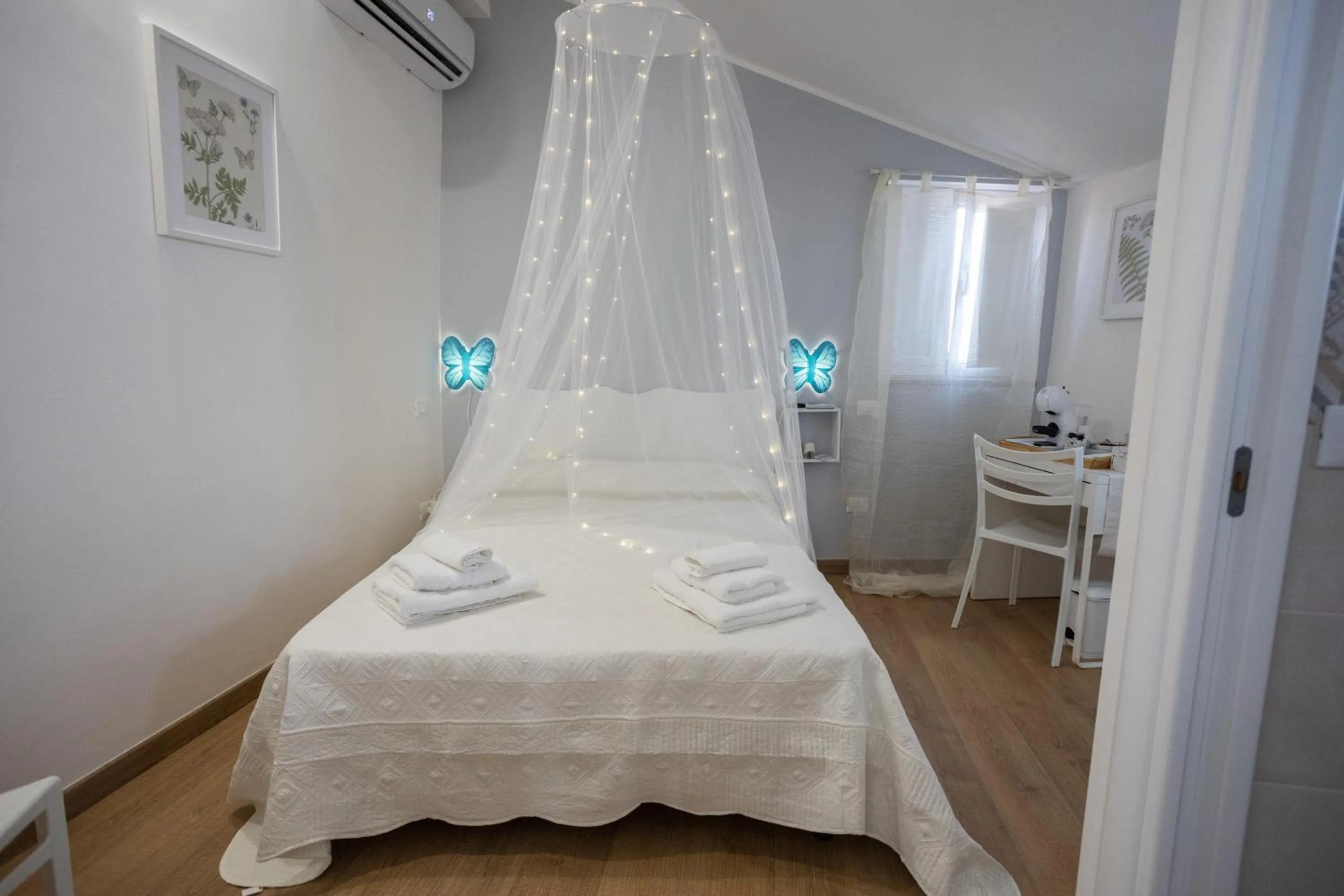 Bed in EXCLUSIVE ROOMS Al Vicoletto