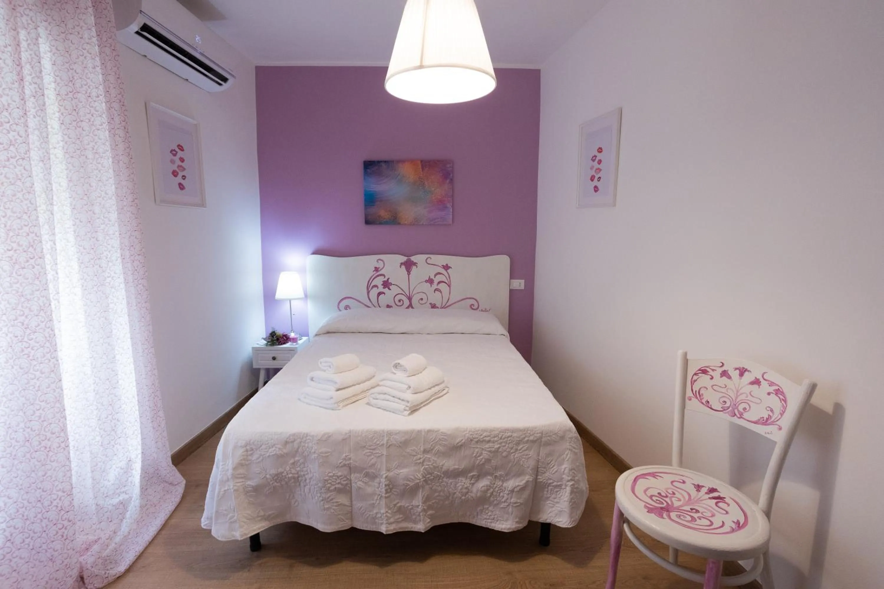 Bed in EXCLUSIVE ROOMS Al Vicoletto