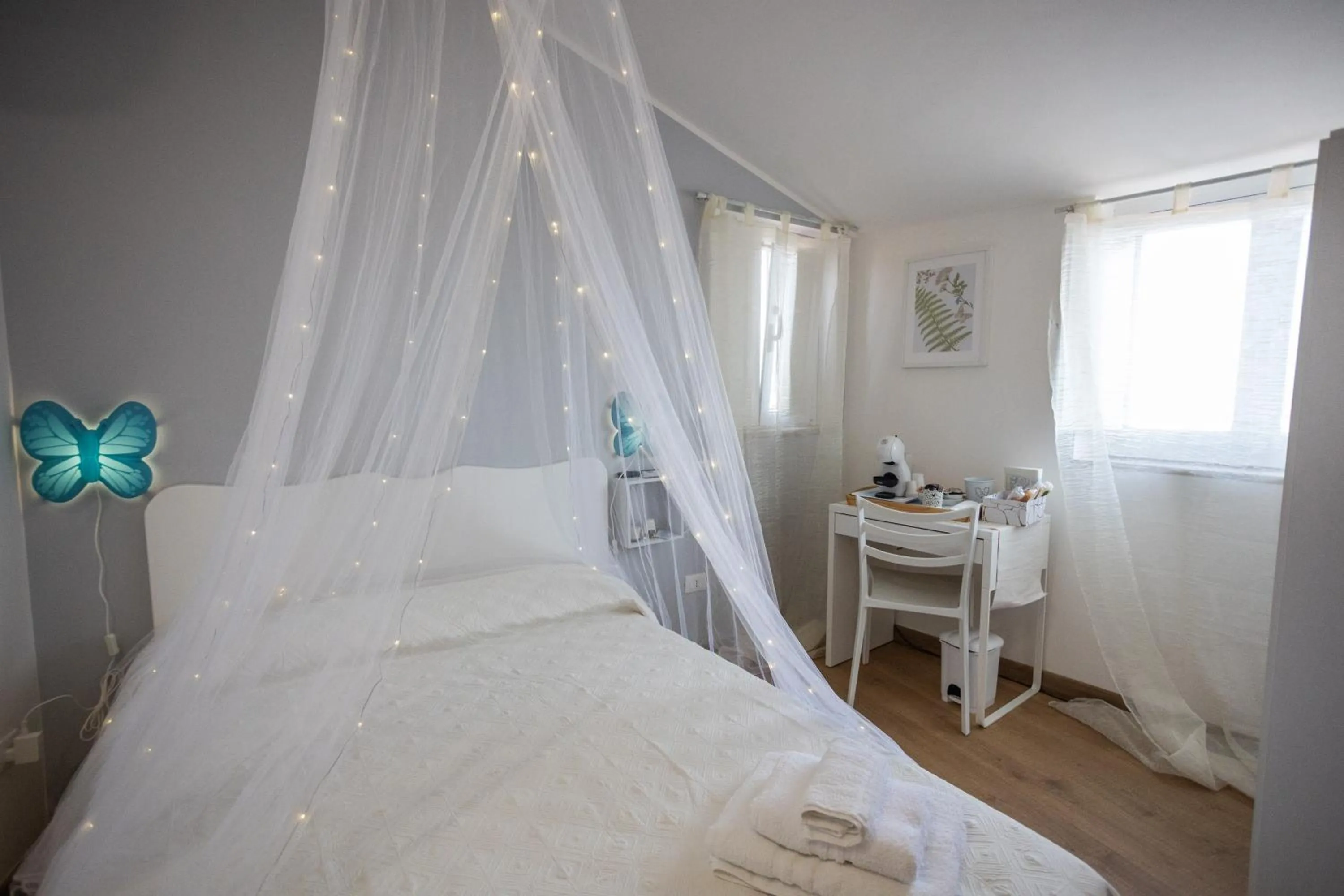 Bed in EXCLUSIVE ROOMS Al Vicoletto