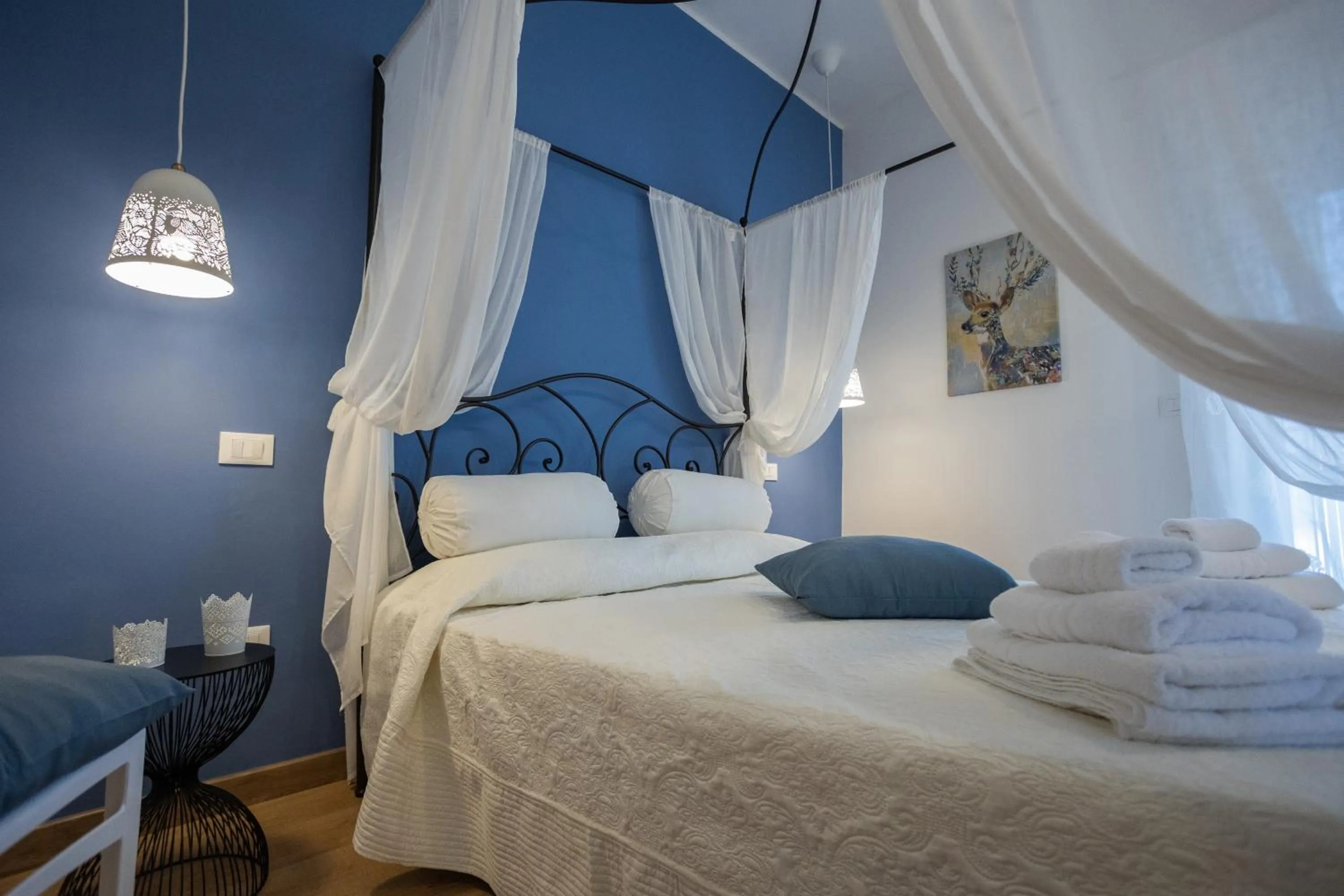 Bed in EXCLUSIVE ROOMS Al Vicoletto