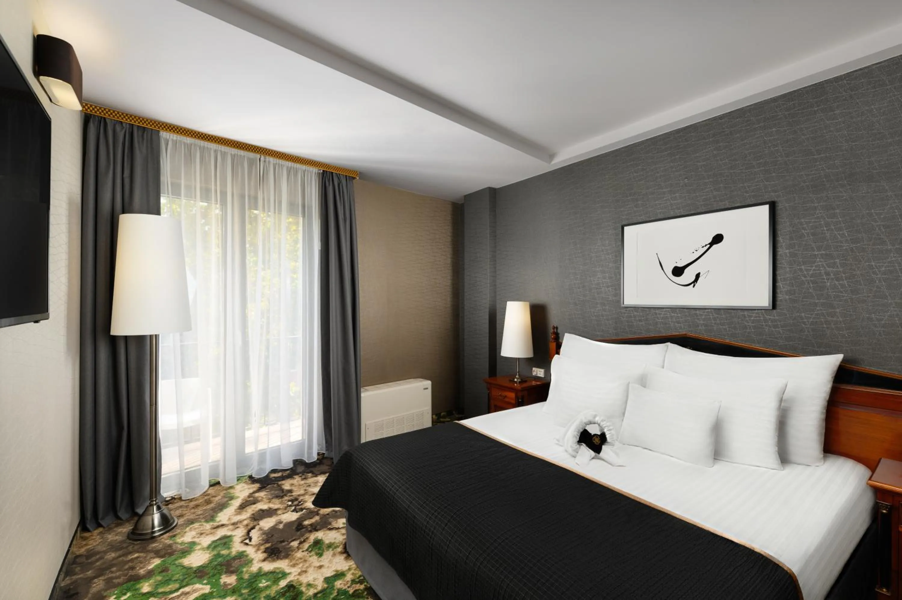 Bed in Hotel Divinus