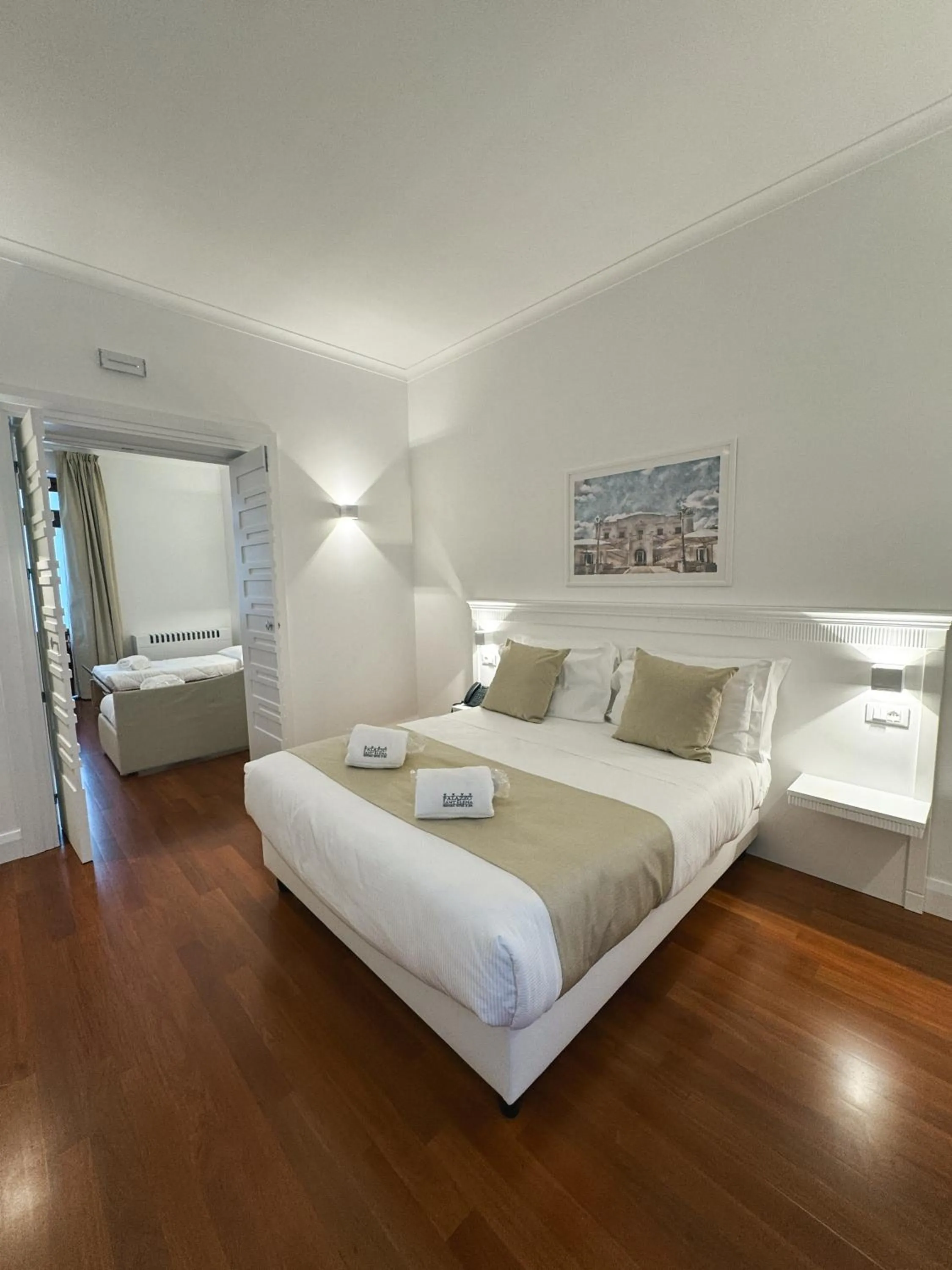 Bed in Palazzo Sant'Elena Historic Hotel