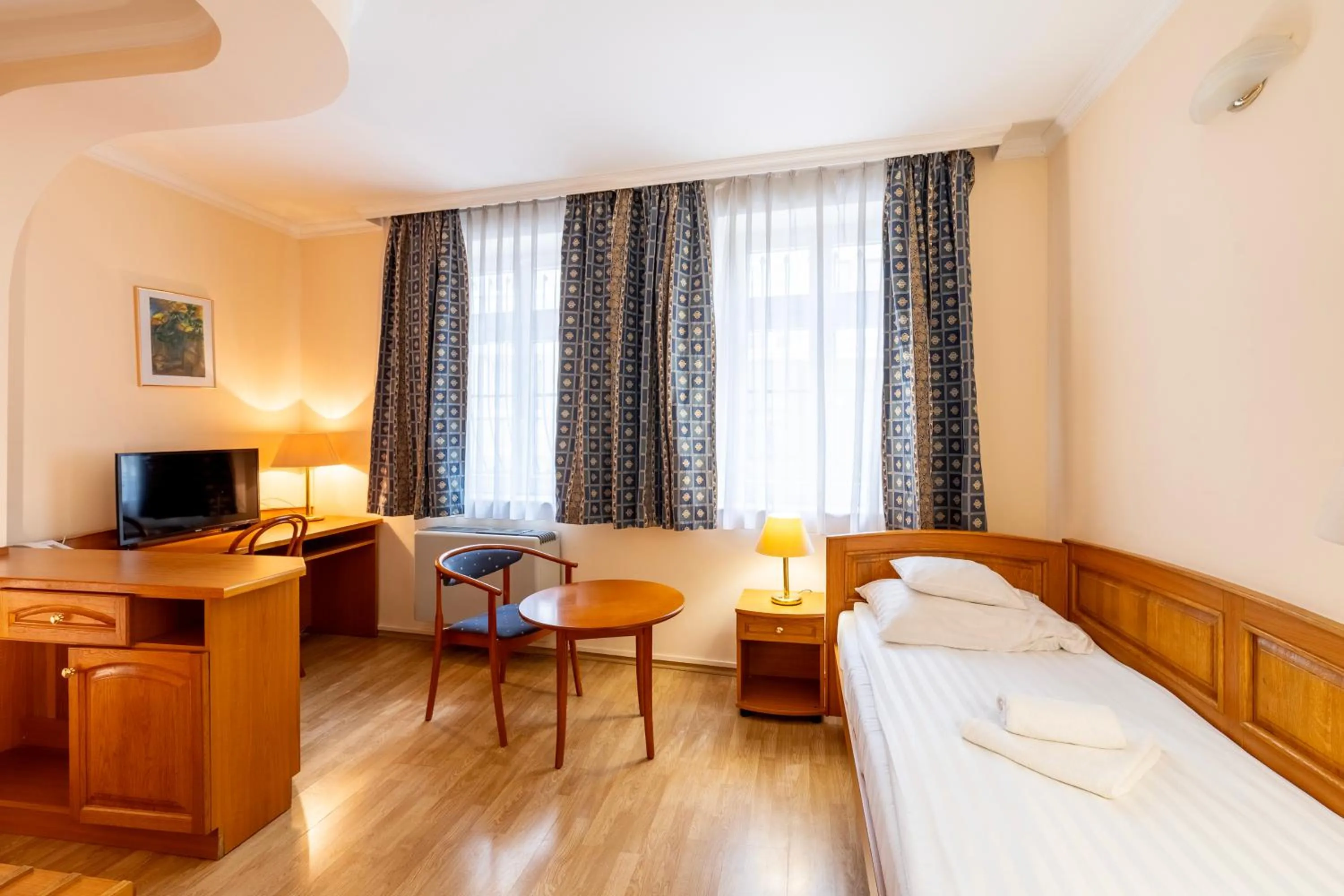 Bed in Hotel Pannonia