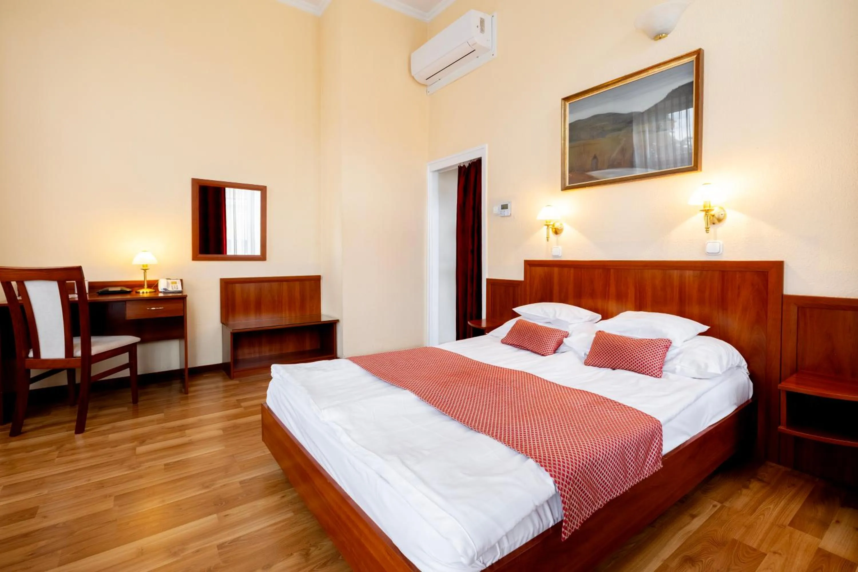 Bed in Hotel Pannonia