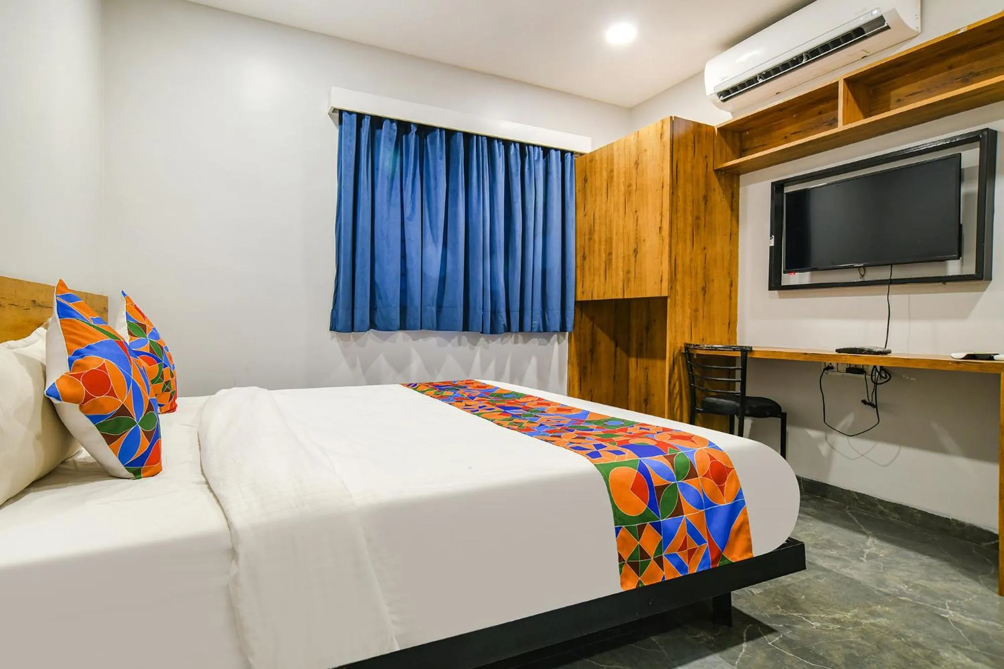 Communal lounge/ TV room in FabHotel Unity Landmark