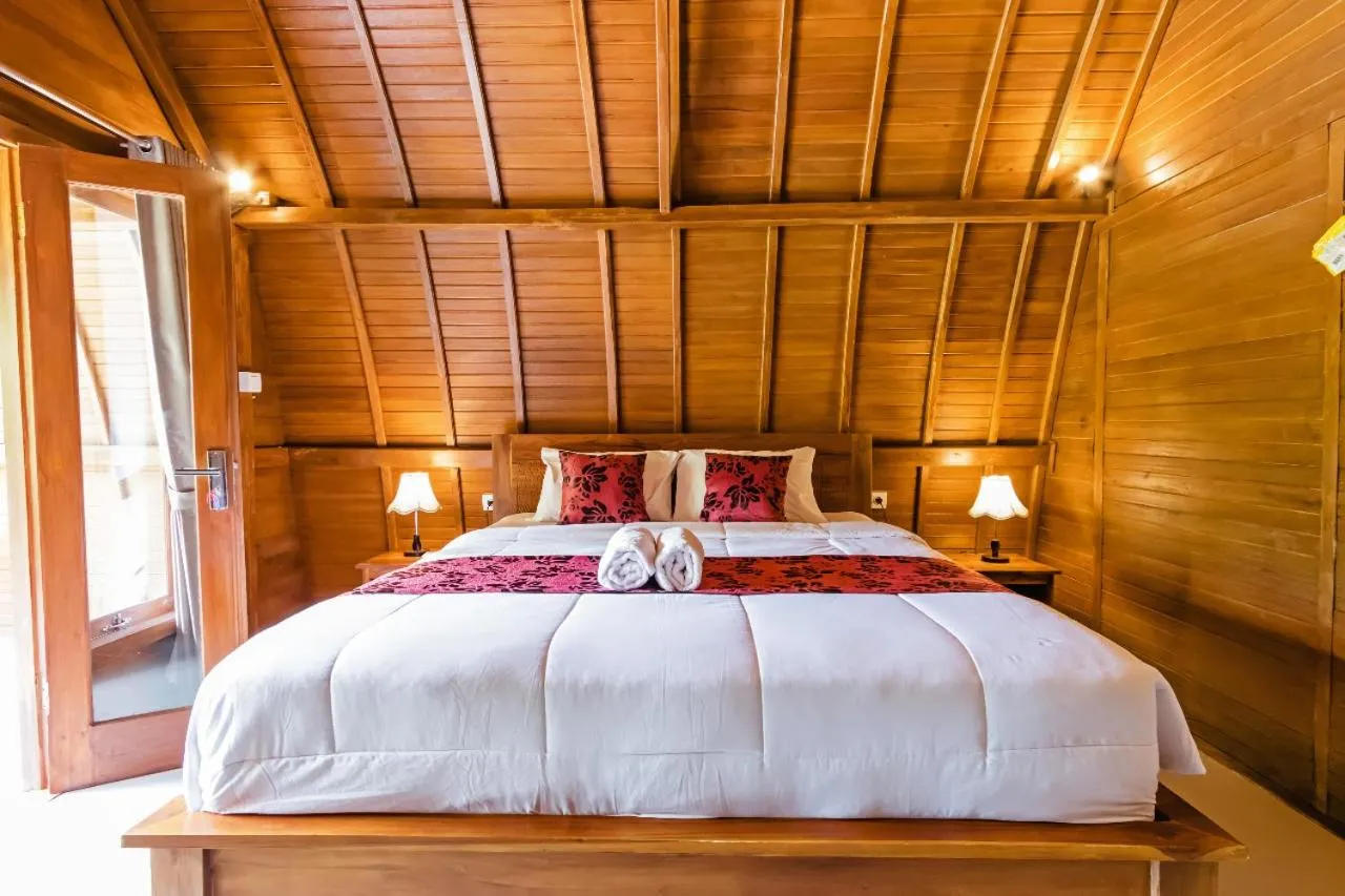 Bed in Kelingking Mesari Villa and Spa