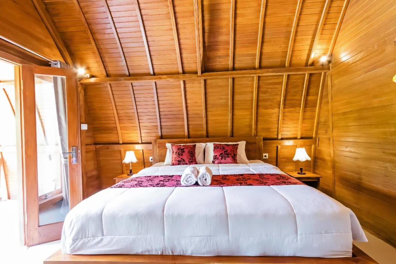 Bed in Kelingking Mesari Villa and Spa