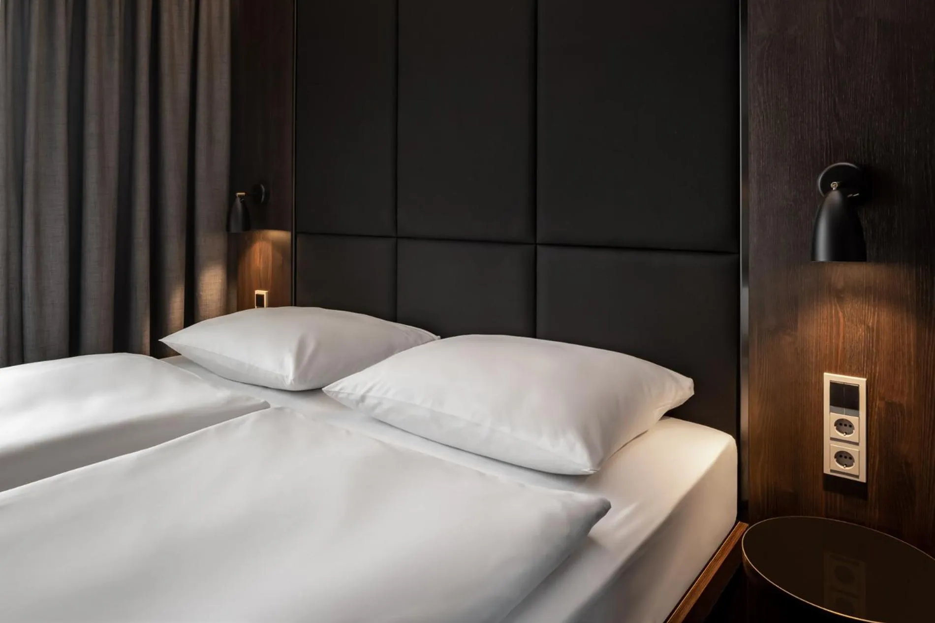 Bed in Hotel ROMY by AMANO