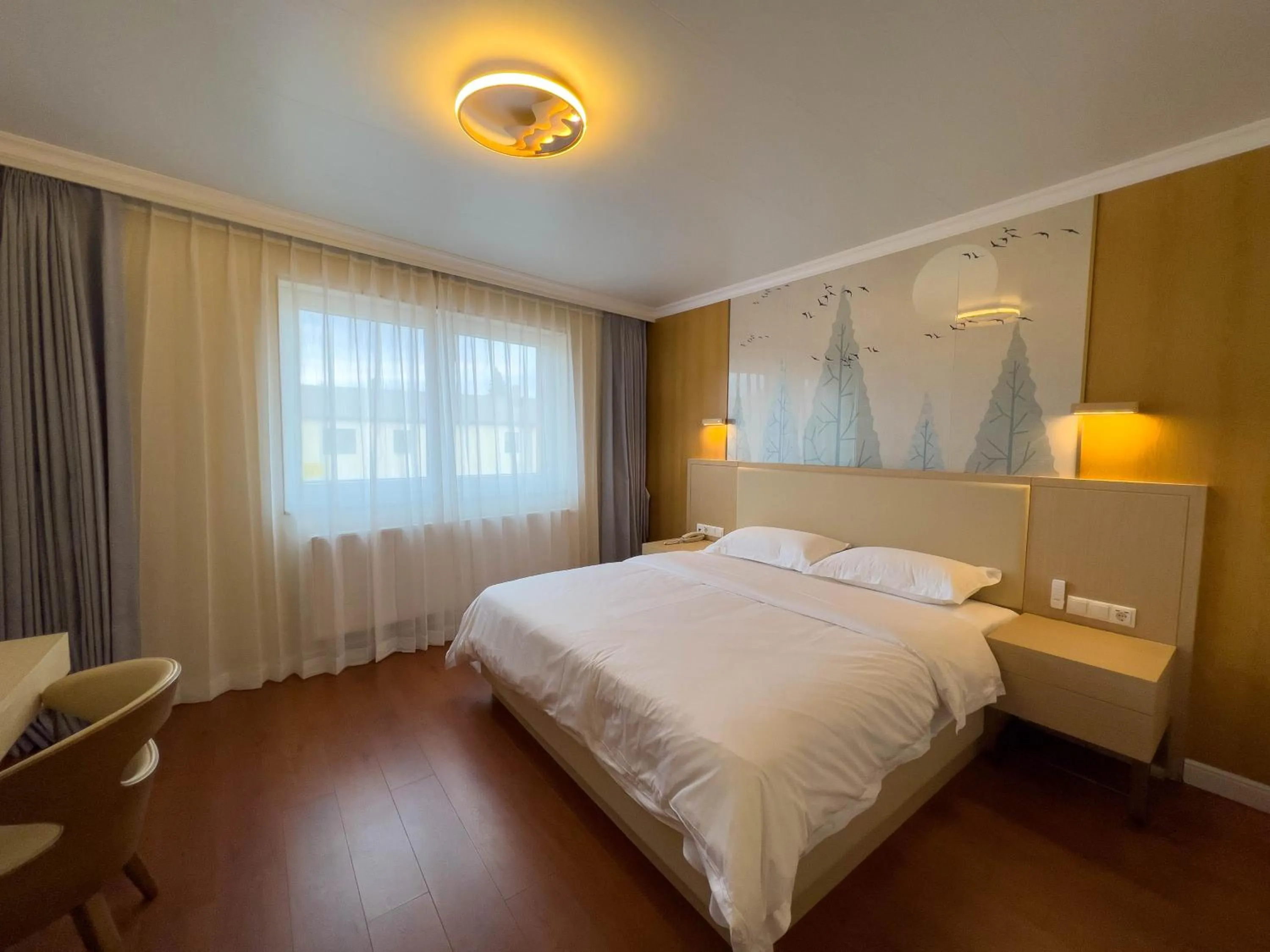 Bed in Mr.Liao Hotel