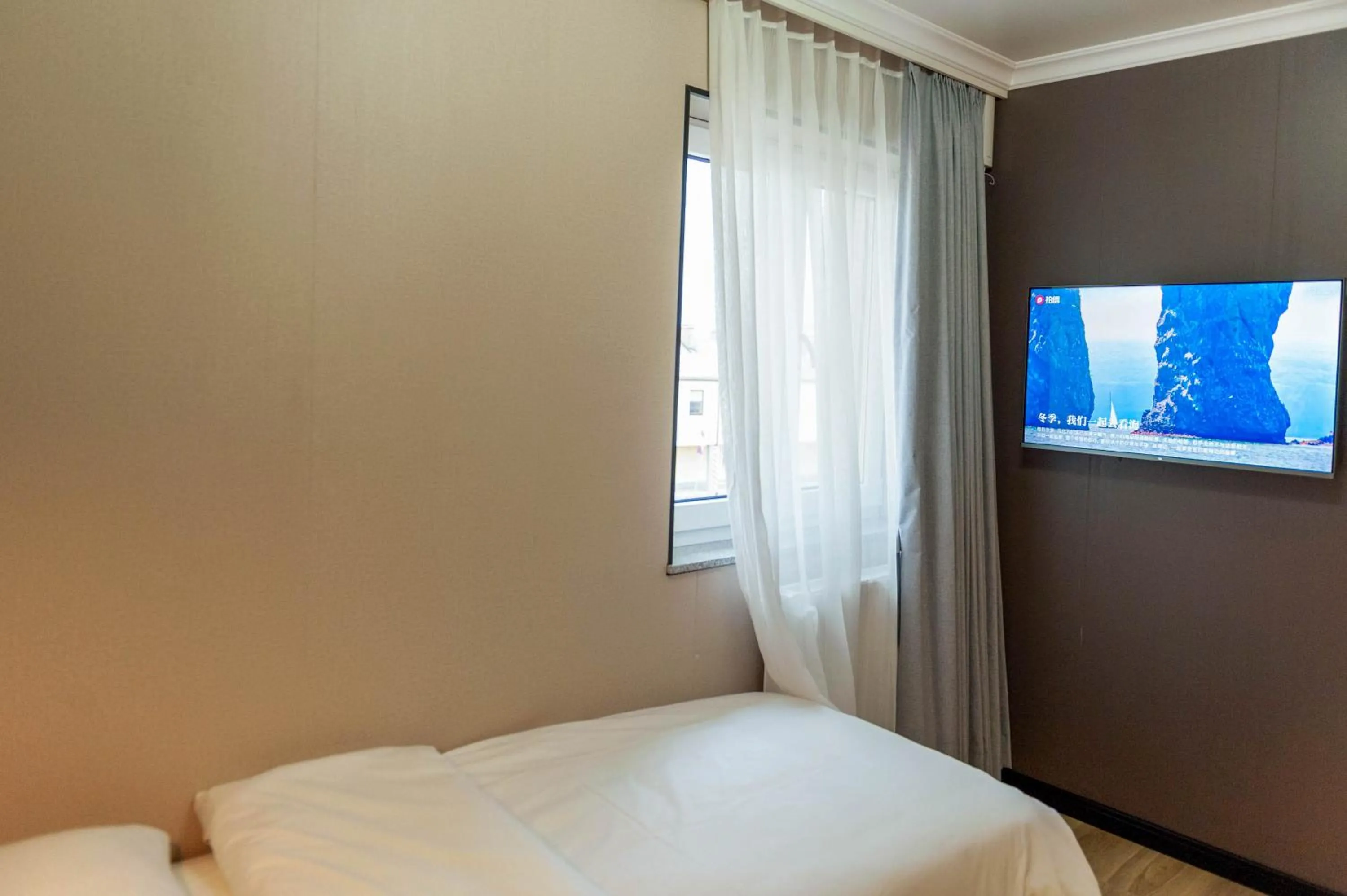 Bed in Mr.Liao Hotel