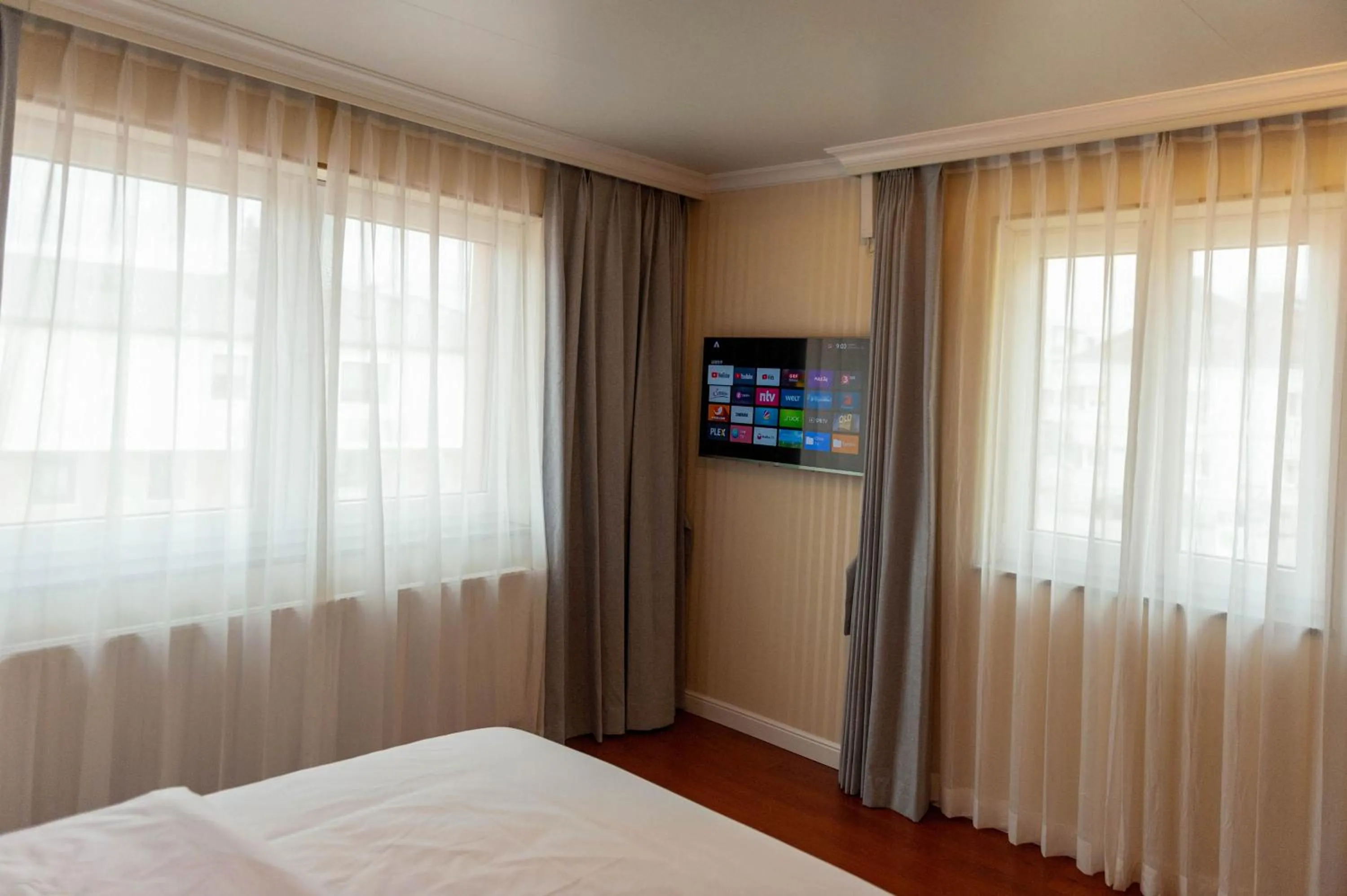 Bed in Mr.Liao Hotel