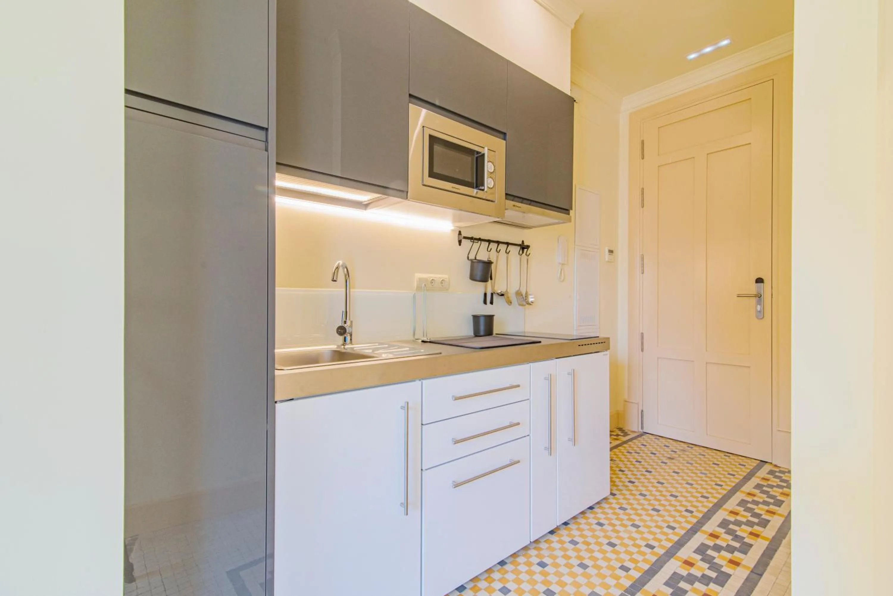 Kitchen or kitchenette in Mosaiko Homes Catedral Granada